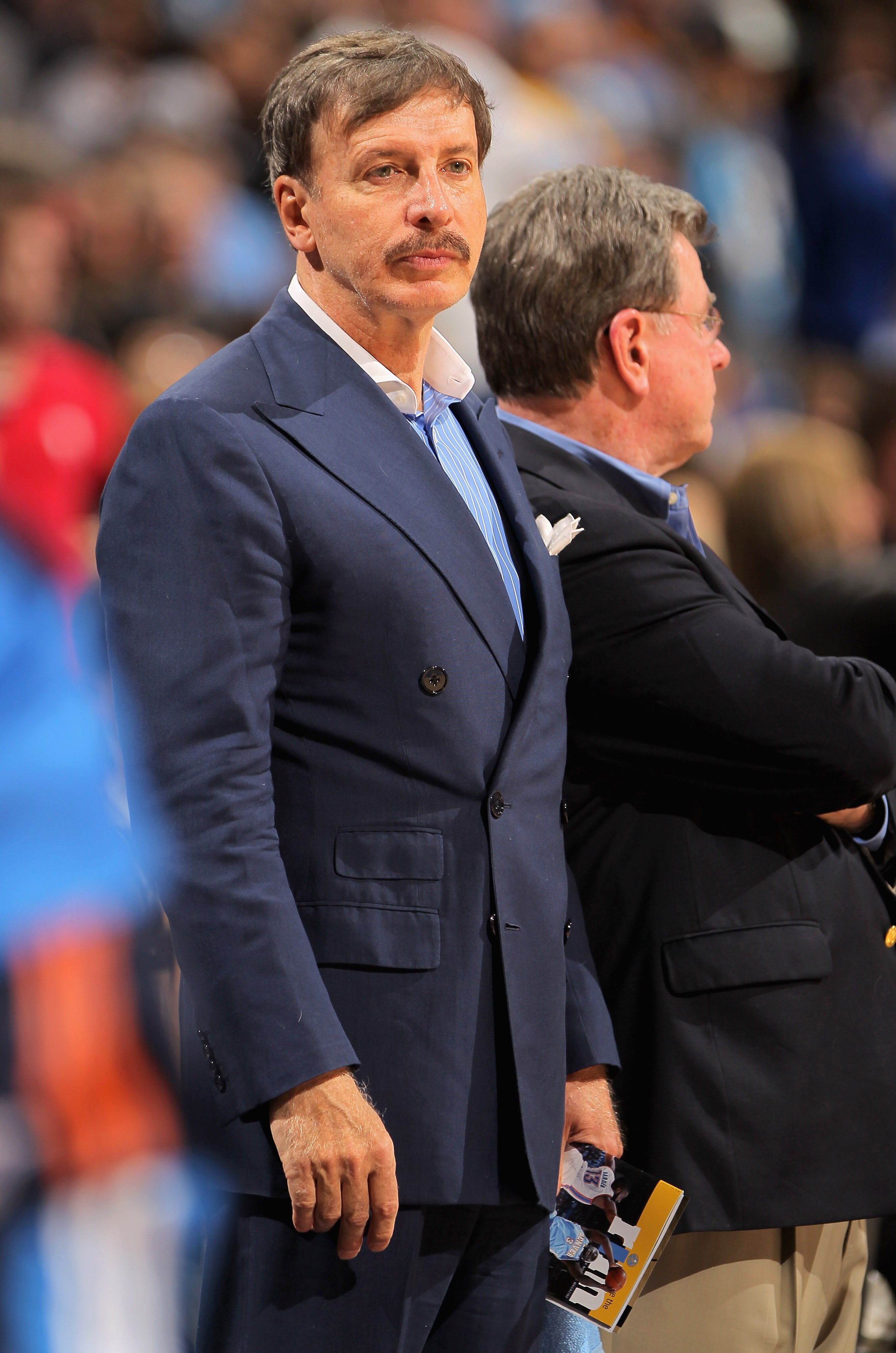 DENVER, CO - APRIL 23:  Stan Kroenke, owner of the Denver Nuggets watches his team from courtside seats as they face the Oklahoma City Thunder in Game Three of the Western Conference Quarterfinals in the 2011 NBA Playoffs on April 23, 2011 at the Pepsi Ce