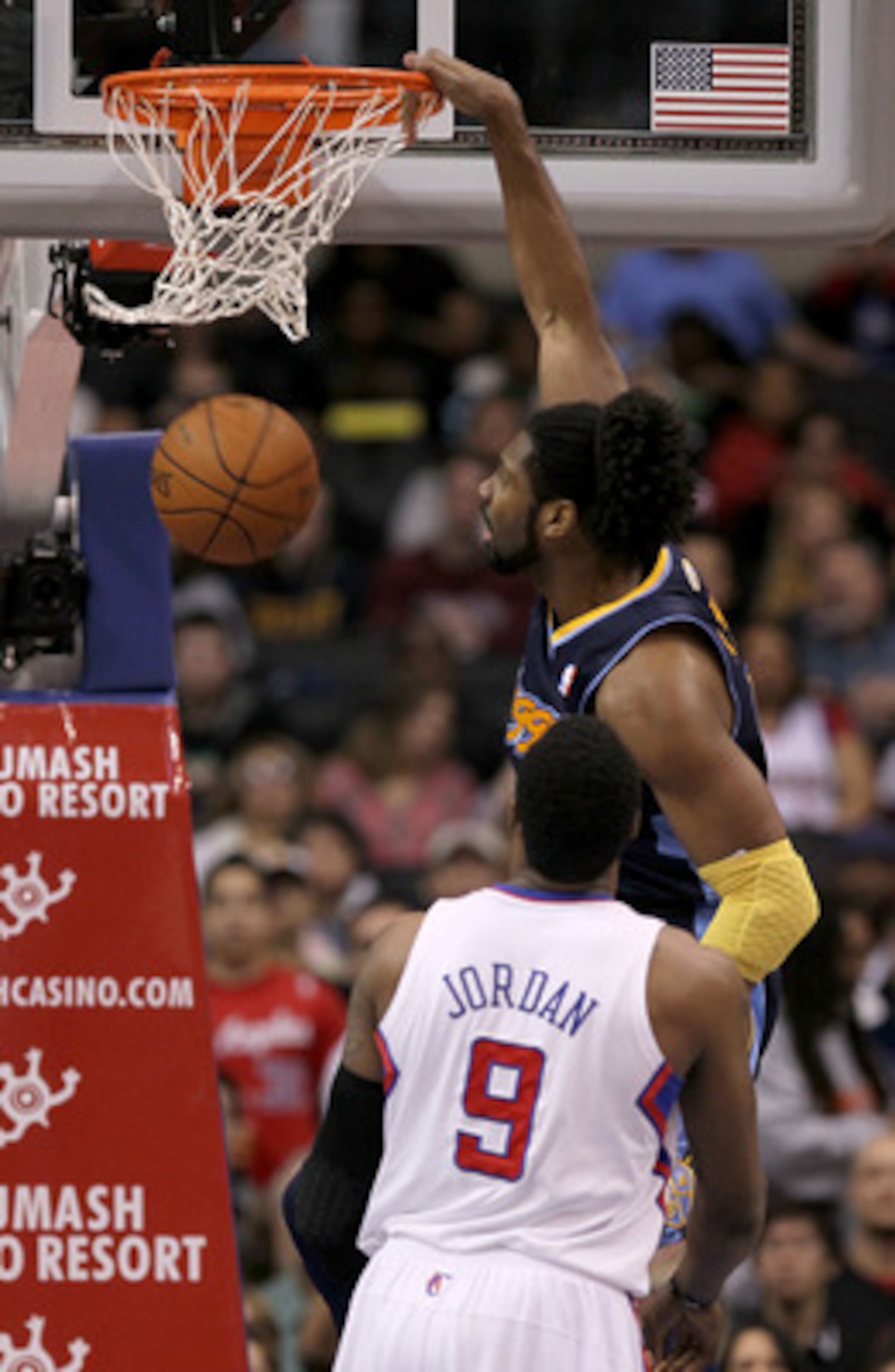 LOS ANGELES, CA - MARCH 5:  Nene #31 of the Denver Nuggets dunks over DAndre Jordan #9 of the Los Angeles Clippers at Staples Center on March 5, 2011 in Los Angeles, California.  NOTE TO USER: User expressly acknowledges and agrees that, by downloading an