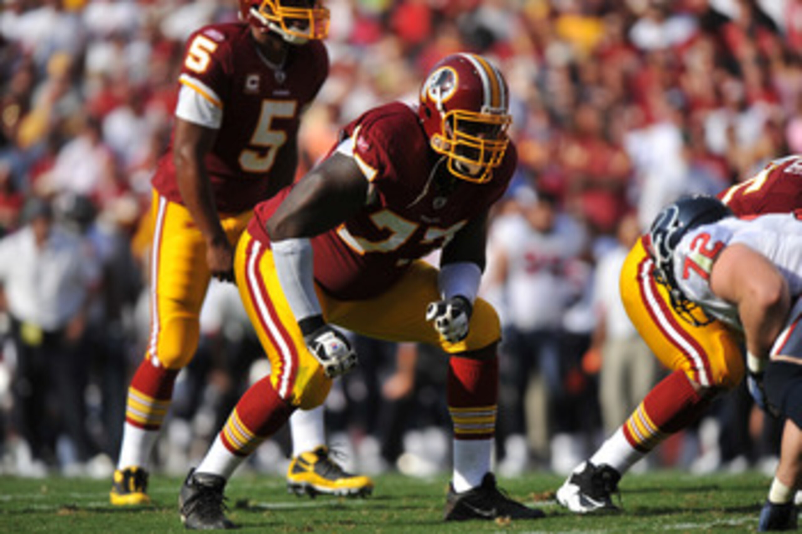 LANDOVER - SEPTEMBER 19:  Jammal Brown #77 of the Washington Redskins defends against the Houston Texans at FedExField on September 19, 2010 in Landover, Maryland. The Texans defeated the Redskins in overtime 30-27. (Photo by Larry French/Getty Images)