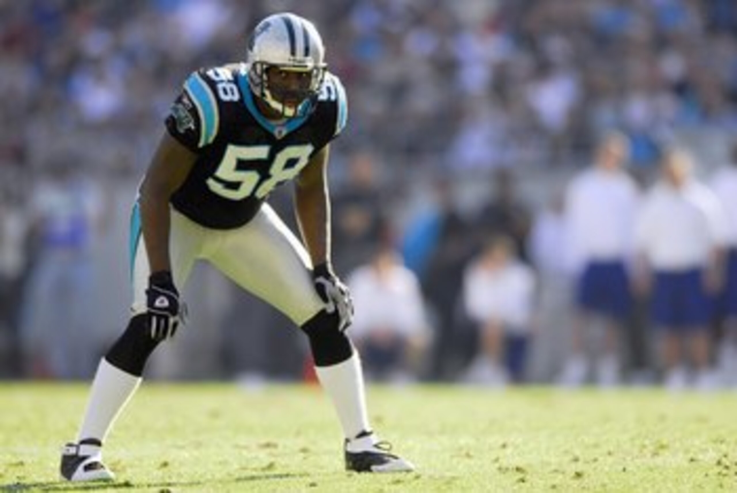 CHARLOTTE, NC - DECEMBER 17:  Thomas Davis #58 of the Carolina Panthers gets ready on the field during the game against the Pittsburgh Steelers on December 17, 2006 at Bank of America Stadium in Charlotte, North Carolina. The Steelers defeated the Panther