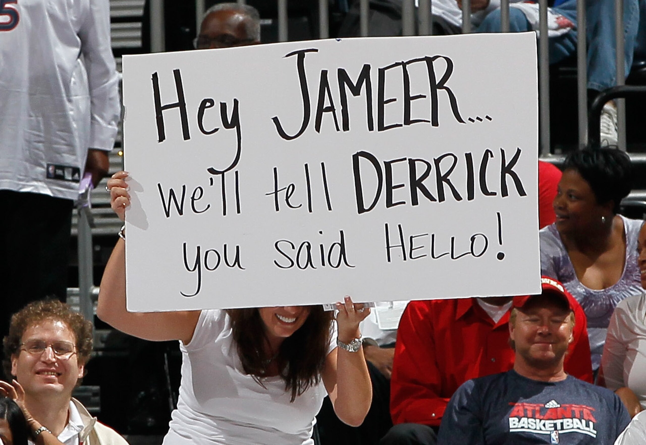 ATLANTA, GA - APRIL 28:  A fan of the Atlanta Hawks holds up a sign against the Orlando Magic during Game Six of the Eastern Conference Quarterfinals in the 2011 NBA Playoffs at Philips Arena on April 28, 2011 in Atlanta, Georgia.  NOTE TO USER: User expr