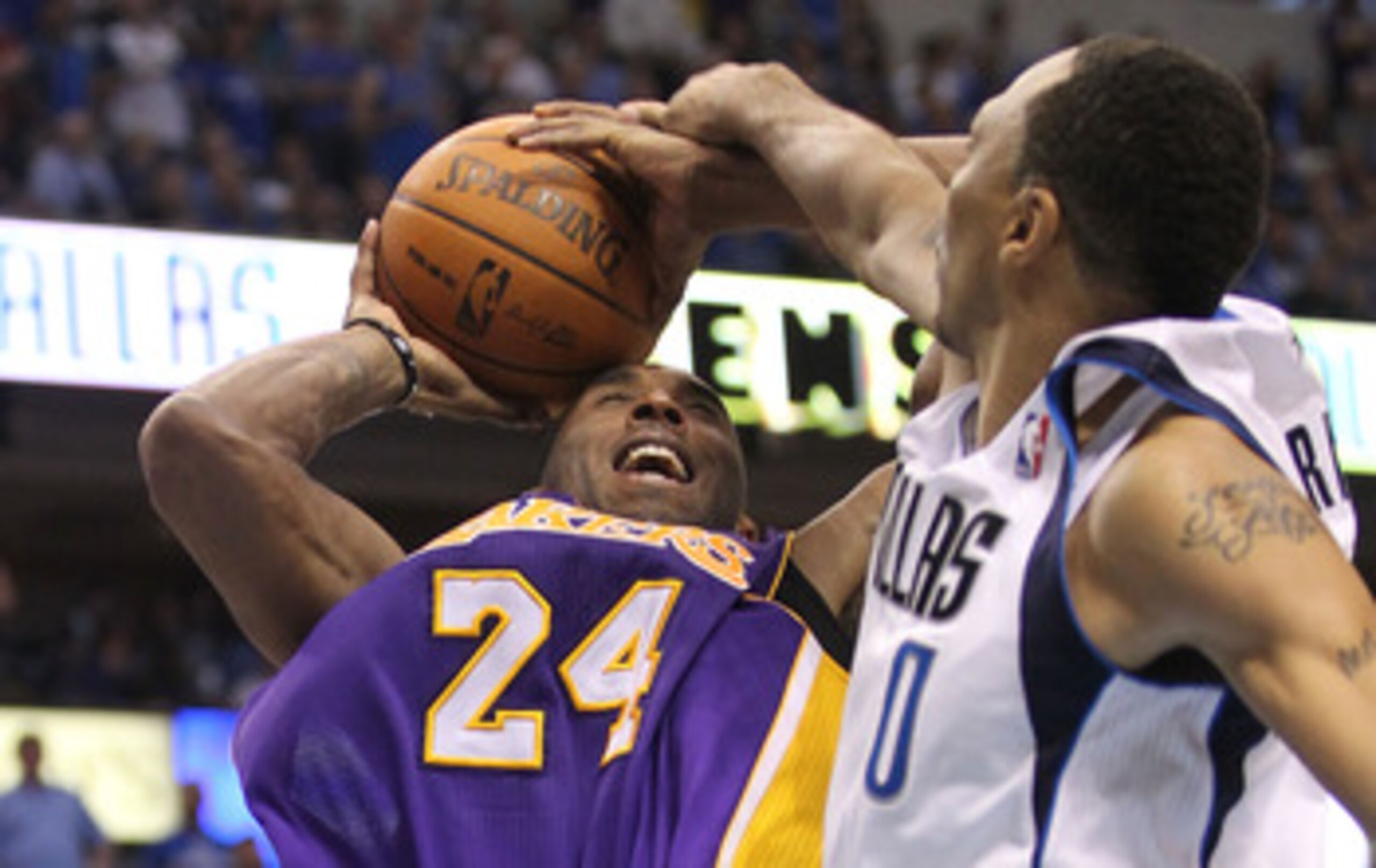 DALLAS, TX - MAY 08: Guard Kobe Bryant #24 of the Los Angeles Lakers is fouled by Shawn Marion #0 of the Dallas Mavericks in Game Four of the Western Conference Semifinals during the 2011 NBA Playoffs on May 8, 2011 at American Airlines Center in Dallas, DALLAS, TX - MAY 08: Guard Kobe Bryant #24 of the Los Angeles Lakers is fouled by Shawn Marion #0 of the Dallas Mavericks in Game Four of the Western Conference Semifinals during the 2011 NBA Playoffs on May 8, 2011 at American Airlines Center in Dallas,