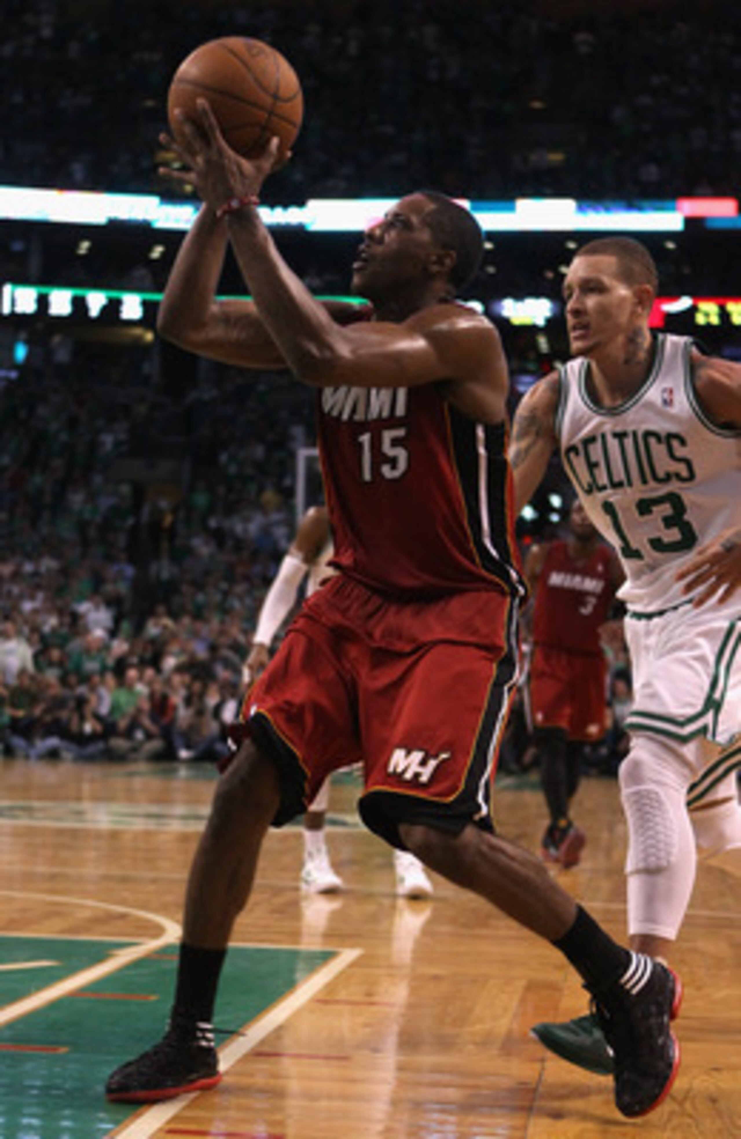 BOSTON, MA - MAY 07: Mario Chalmers #15 of the Miami Heat heads for the basket as Delonte West #13 of the Boston Celtics defends in Game Three of the Eastern Conference Semifinals in the 2011 NBA Playoffs on May 7, 2011 at the TD Garden in Boston, Massac BOSTON, MA - MAY 07: Mario Chalmers #15 of the Miami Heat heads for the basket as Delonte West #13 of the Boston Celtics defends in Game Three of the Eastern Conference Semifinals in the 2011 NBA Playoffs on May 7, 2011 at the TD Garden in Boston, Massac