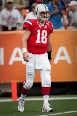 HONOLULU - JANUARY 30:  Peyton Manning, #18 of the Indianapolis Colts, stands on the field during the 2011 NFL Pro Bowl at Aloha Stadium on January 30, 2011 in Honolulu, Hawaii.  (Photo by Kent Nishimura/Getty Images)