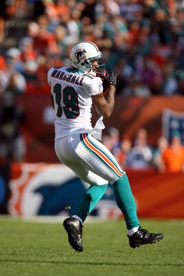 MIAMI, FL - DECEMBER 19:  Receiver Brandon Marshall #19 of the Miami Dolphins makes a catch during a game against the Buffalo Bills at Sun Life Stadium on December 19, 2010 in Miami, Florida. The Bills defeated the Dolphins 17-14.  (Photo by Marc Serota/G