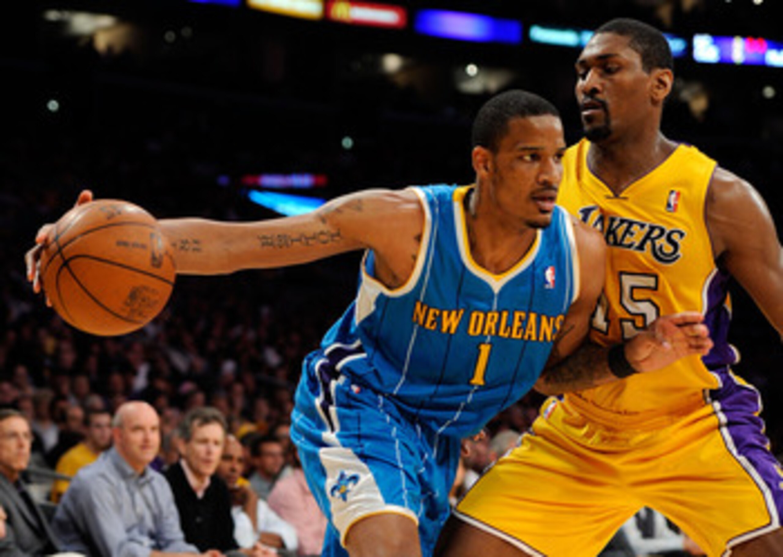LOS ANGELES, CA - APRIL 20: Trevor Ariza #1 of the New Orleans Hornets drives on Ron Artest #15 of the Los Angeles Lakers in the first quarter in Game Two of the Western Conference Quarterfinals in the 2011 NBA Playoffs on April 20, 2011 at Staples Cente LOS ANGELES, CA - APRIL 20: Trevor Ariza #1 of the New Orleans Hornets drives on Ron Artest #15 of the Los Angeles Lakers in the first quarter in Game Two of the Western Conference Quarterfinals in the 2011 NBA Playoffs on April 20, 2011 at Staples Cente