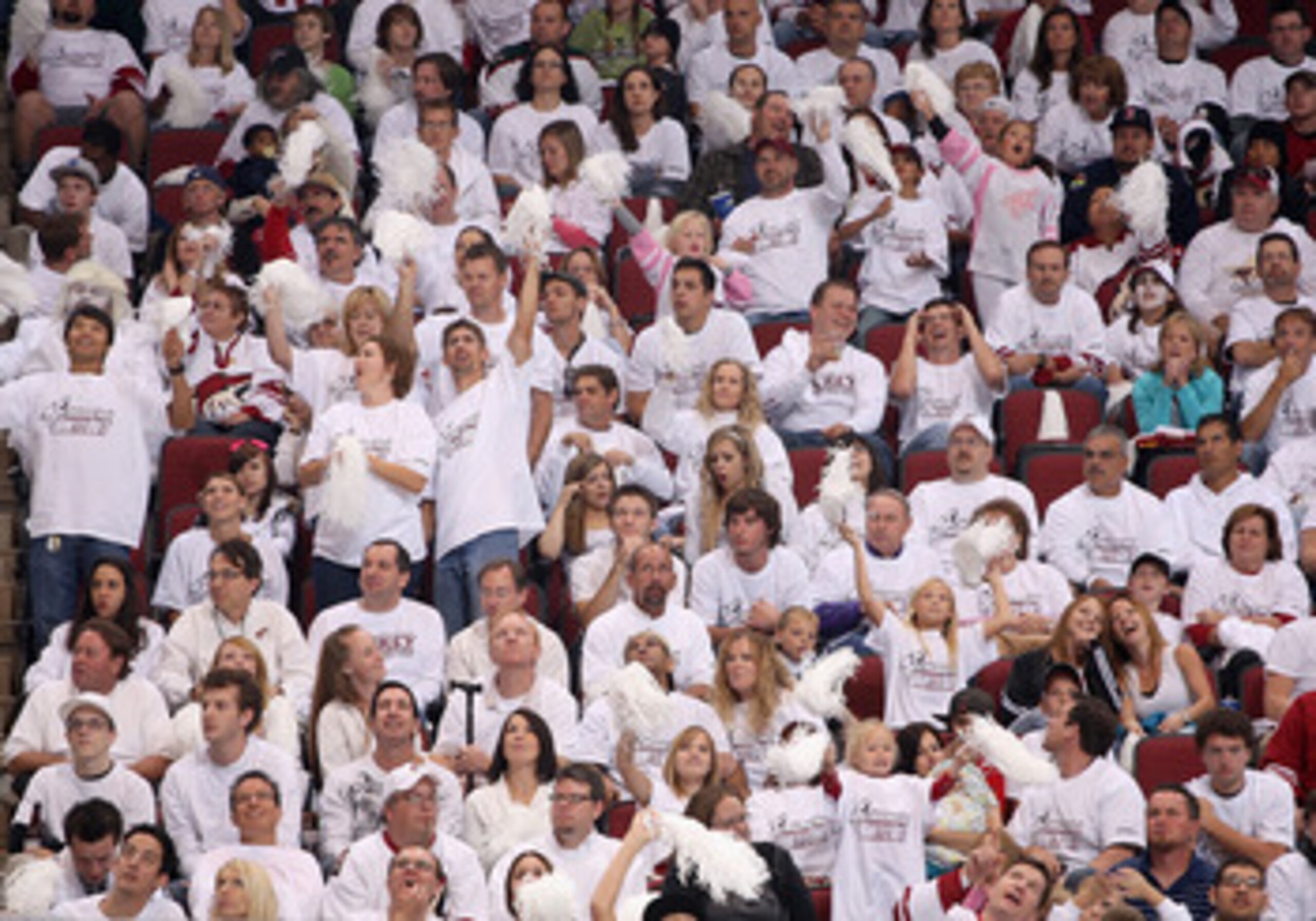GLENDALE, AZ - OCTOBER 10: Fans wear white t shirts in the 'white out' night at of the NHL game between the Columbus Blue Jackets and the Phoenix Coyotes at Jobing.com Arena on October 10, 2009 in Glendale, Arizona. The Blue Jackets defeated the Coyotes GLENDALE, AZ - OCTOBER 10: Fans wear white t shirts in the 'white out' night at of the NHL game between the Columbus Blue Jackets and the Phoenix Coyotes at Jobing.com Arena on October 10, 2009 in Glendale, Arizona. The Blue Jackets defeated the Coyotes
