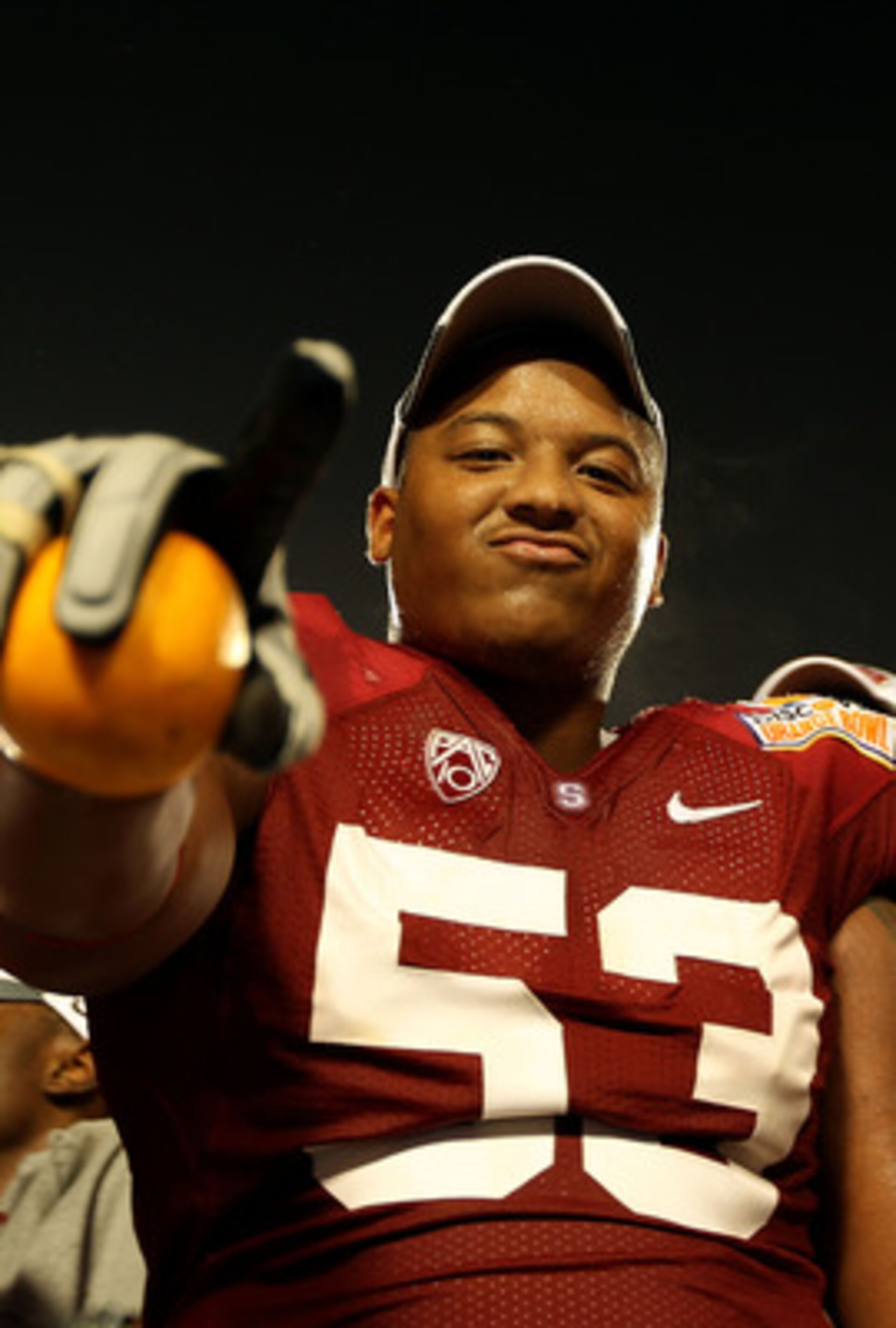 MIAMI, FL - JANUARY 03:  Derek Hall #53 of the Stanford Cardinal celebrates after Stanford won 40-12 against the Virginia Tech Hokies during the 2011 Discover Orange Bowl at Sun Life Stadium on January 3, 2011 in Miami, Florida.  (Photo by Mike Ehrmann/Ge