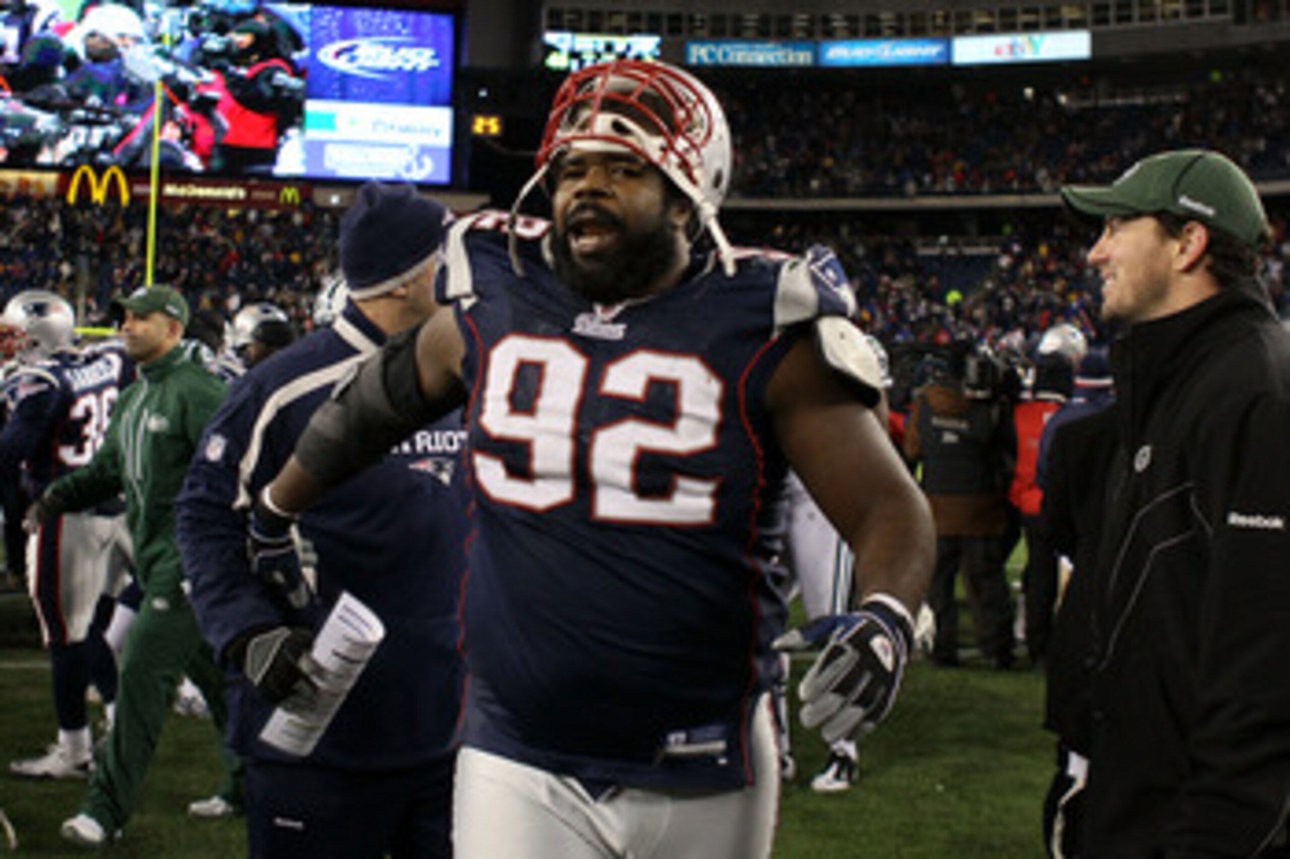 FOXBORO, MA - DECEMBER 06:  Gerard Warren #92 of the New England Patriots celebrates as he walks off the field after the Patriots won 45-3 against the New York Jets at Gillette Stadium on December 6, 2010 in Foxboro, Massachusetts.  (Photo by Elsa/Getty I