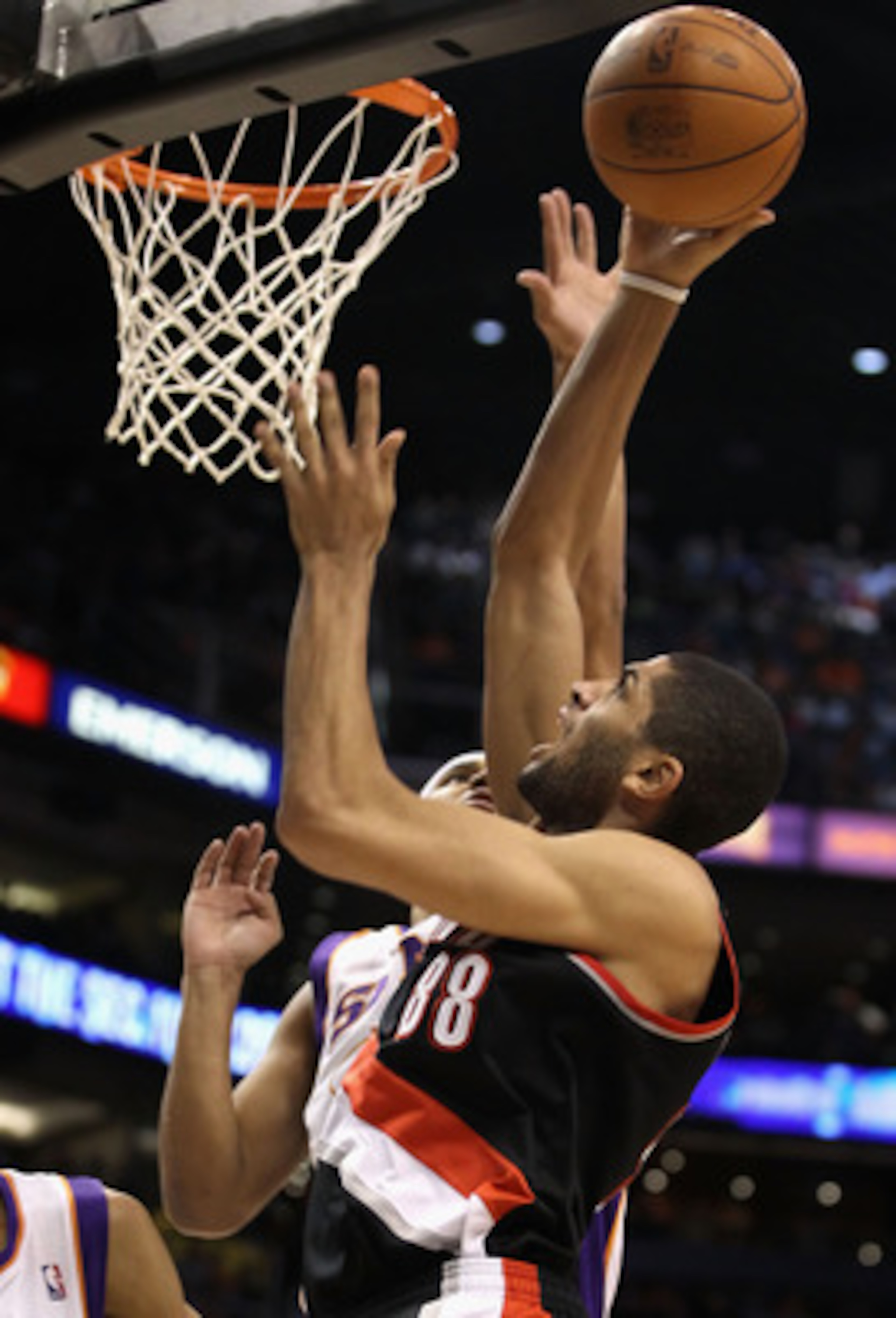 PHOENIX, AZ - JANUARY 14:  Nicolas Batum #88 of the Portland Trail Blazers puts up a shot against the Phoenix Suns during the NBA game at US Airways Center on January 14, 2011 in Phoenix, Arizona.  NOTE TO USER: User expressly acknowledges and agrees that