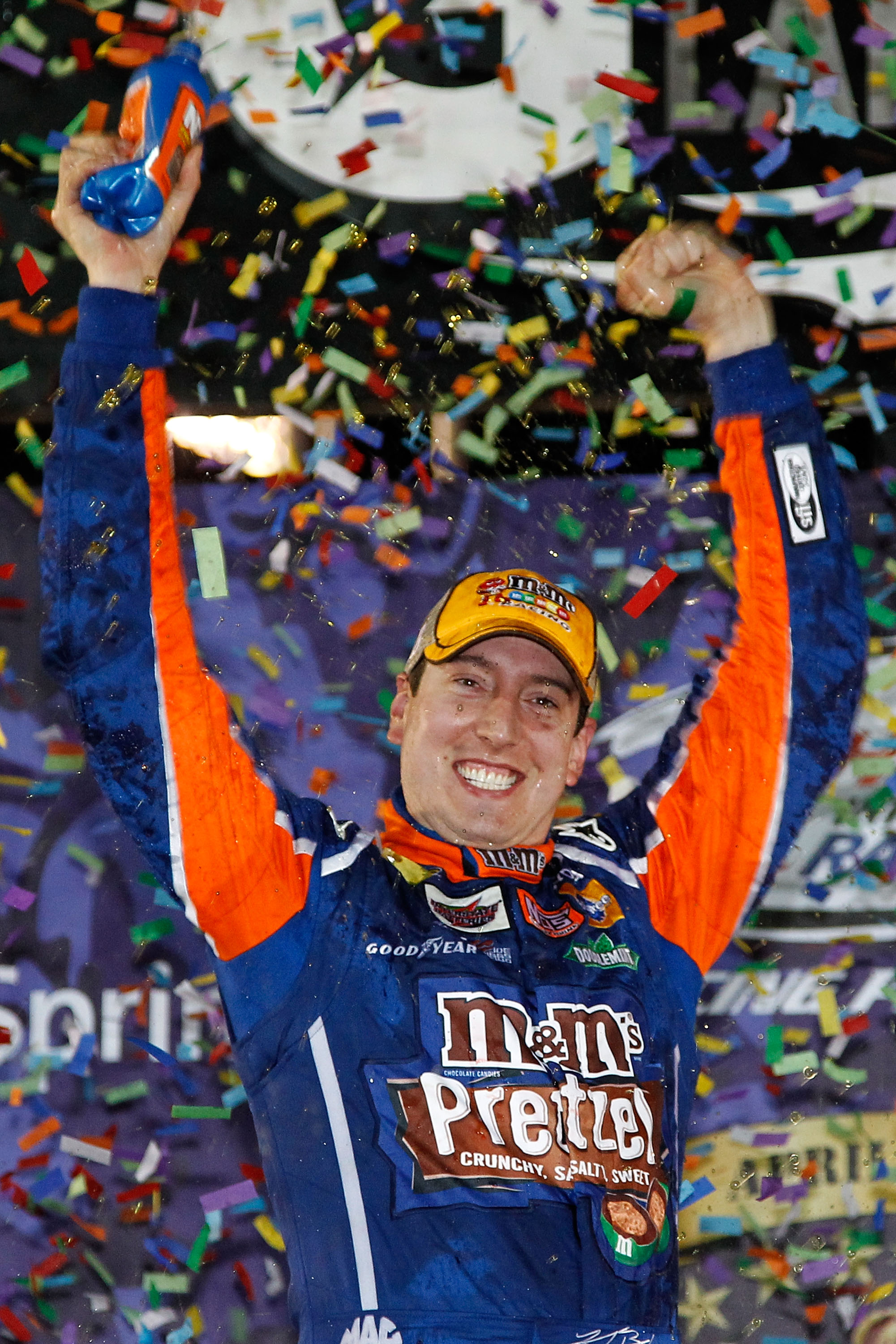 RICHMOND, VA - APRIL 30:  Kyle Busch, driver of the #18 M&M's Pretzel Toyota, celebrates in victory lane after winning the NASCAR Sprint Cup Series Crown Royal Presents The Matthew & Daniel Hansen 400 at Richmond International Raceway on April 30, 2011 in