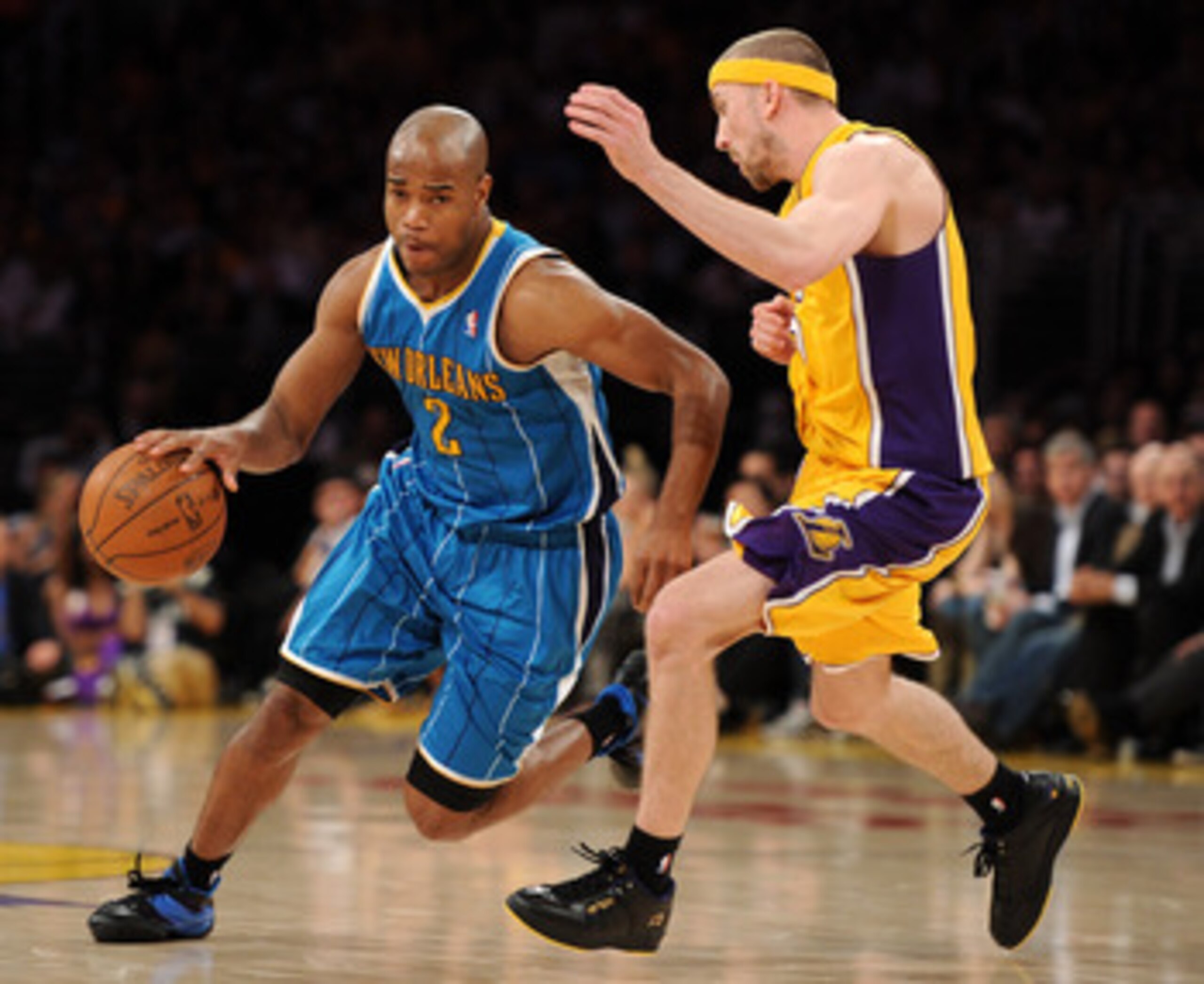 LOS ANGELES, CA - APRIL 26:  Jarrett Jack #2 of the New Orleans Hornets drives on Steve Blake #5 of the Los Angeles Lakers in Game Five of the Western Conference Quarterfinals in the 2011 NBA Playoffs on April 26, 2011 at Staples Center in Los Angeles, Ca