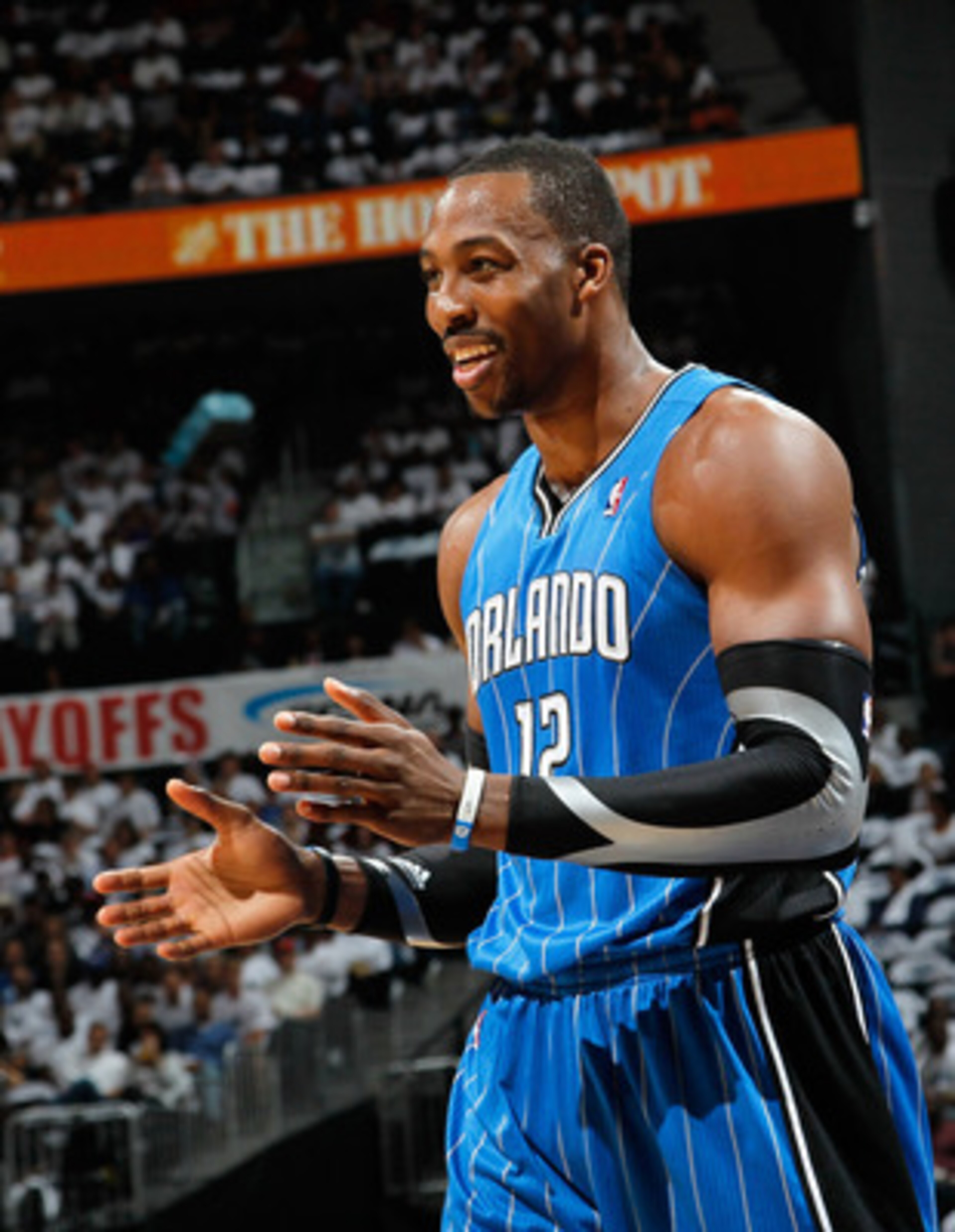 ATLANTA, GA - APRIL 22: Dwight Howard #12 of the Orlando Magic against the Atlanta Hawks during Game Three of the Eastern Conference Quarterfinals in the 2011 NBA Playoffs at Philips Arena on April 22, 2011 in Atlanta, Georgia. NOTE TO USER: User expres ATLANTA, GA - APRIL 22: Dwight Howard #12 of the Orlando Magic against the Atlanta Hawks during Game Three of the Eastern Conference Quarterfinals in the 2011 NBA Playoffs at Philips Arena on April 22, 2011 in Atlanta, Georgia. NOTE TO USER: User expres