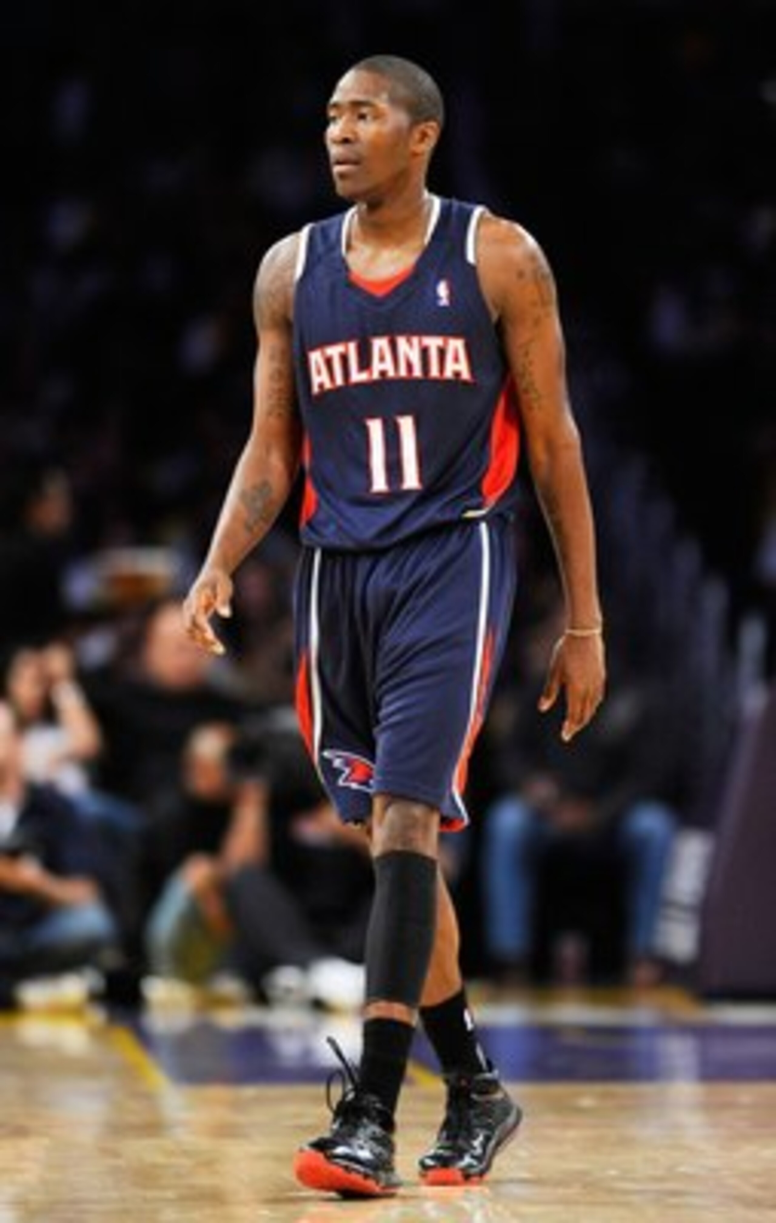LOS ANGELES, CA - NOVEMBER 01:  Jamal Crawford #11  of the Atlanta Hawks walks against Los Angeles Lakers during the NBA basketball game at Staples Center on November 1, 2009 in Los Angeles, California. NOTE TO USER: User expressly acknowledges and agrees