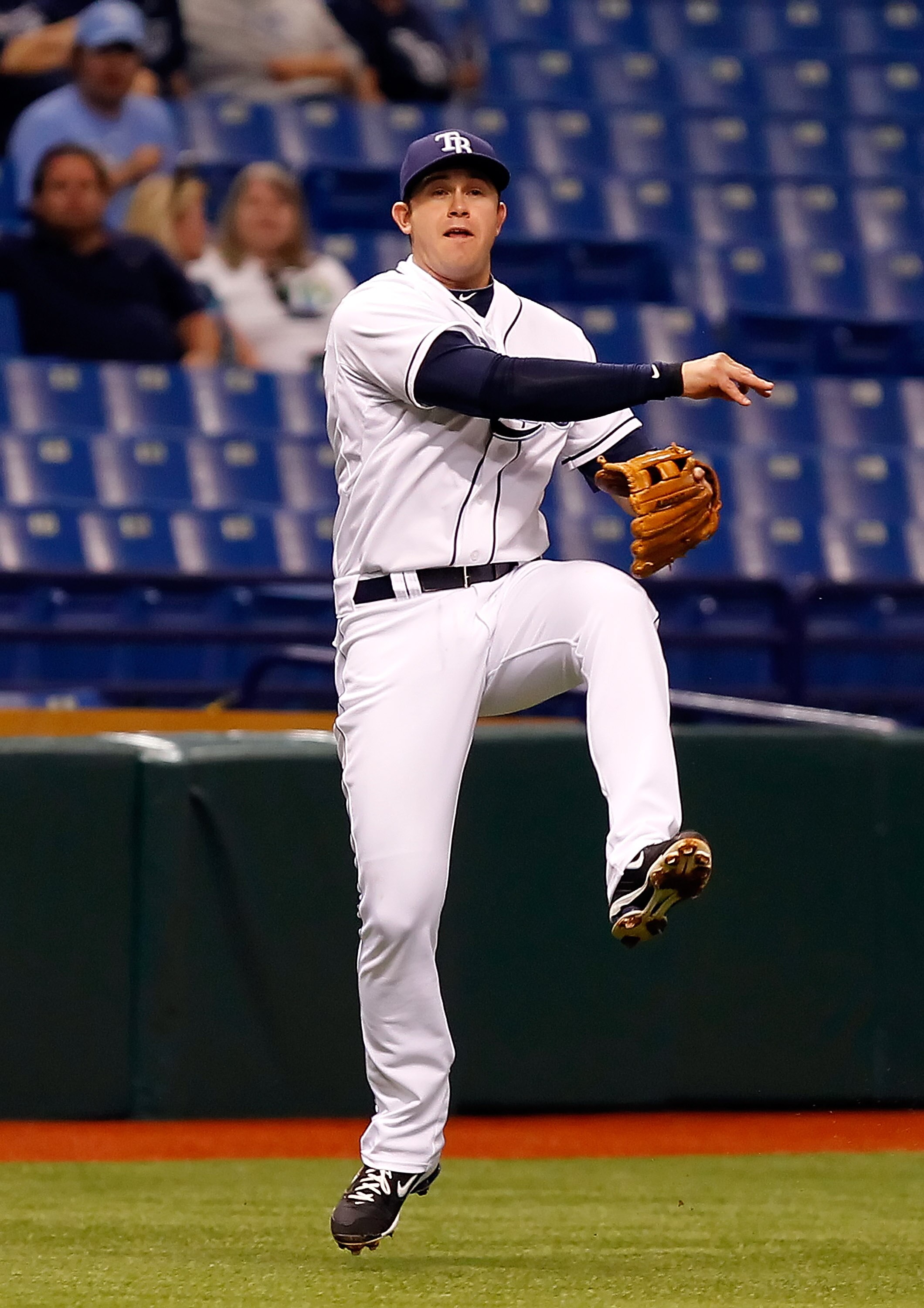 ST. PETERSBURG, FL - MAY 03:  Infielder Evan Longoria #3 of the Tampa Bay Rays throws over to first for an out against the Toronto Blue Jays during the game at Tropicana Field on May 3, 2011 in St. Petersburg, Florida.  (Photo by J. Meric/Getty Images)