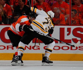 PHILADELPHIA, PA - MAY 02:  Michael Ryder #73 of the Boston Bruins checks Kimmo Timonen #44 of the Philadelphia Flyers during the third period of Game Two of the Eastern Conference Semifinals during the 2011 NHL Stanley Cup Playoffs at Wells Fargo Center 