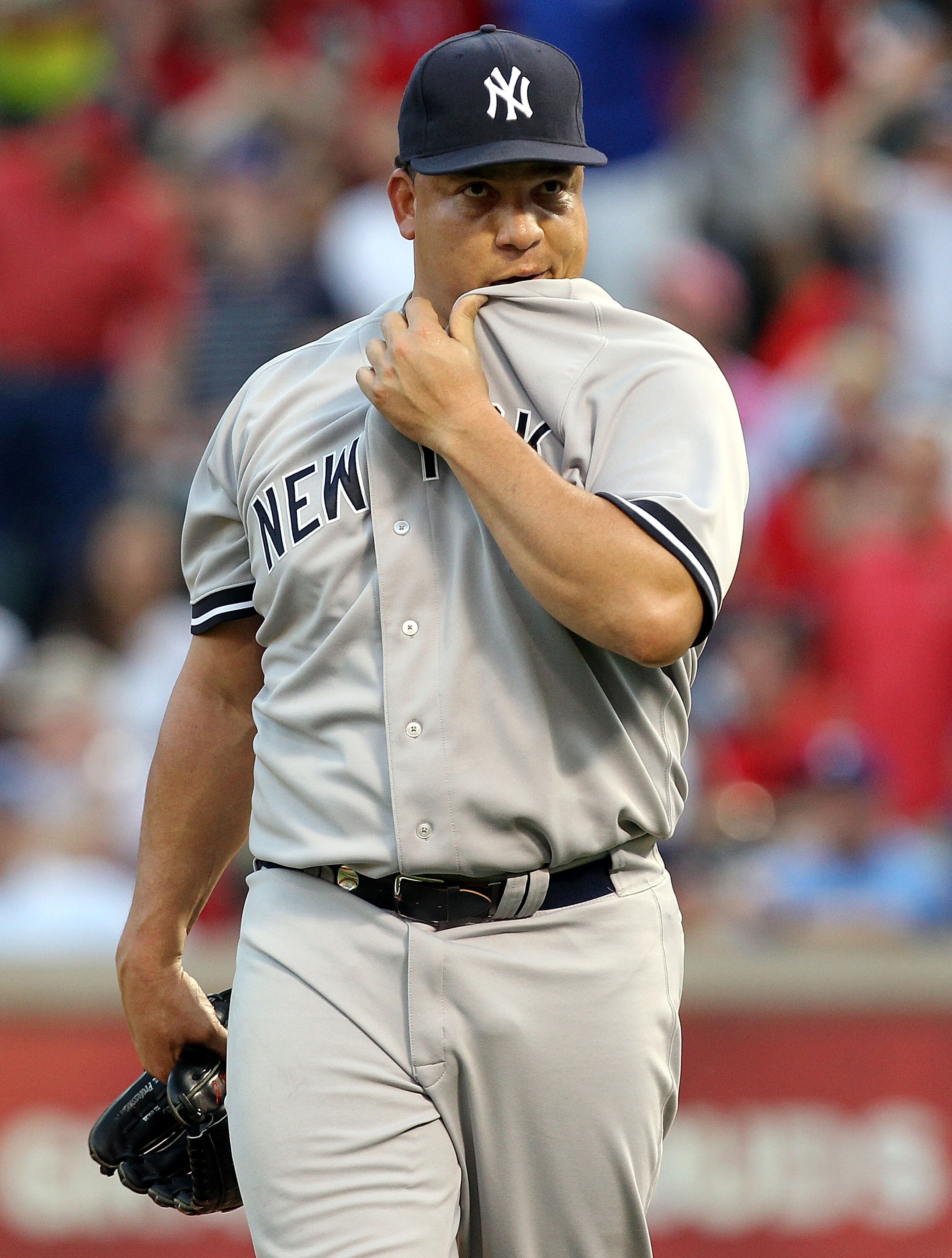 ARLINGTON, TX - MAY 07:  Pitcher Bartolo Colon #40 of the New York Yankees reacts against the Texas Rangers in the first inning at Rangers Ballpark in Arlington on May 7, 2011 in Arlington, Texas.  (Photo by Ronald Martinez/Getty Images)