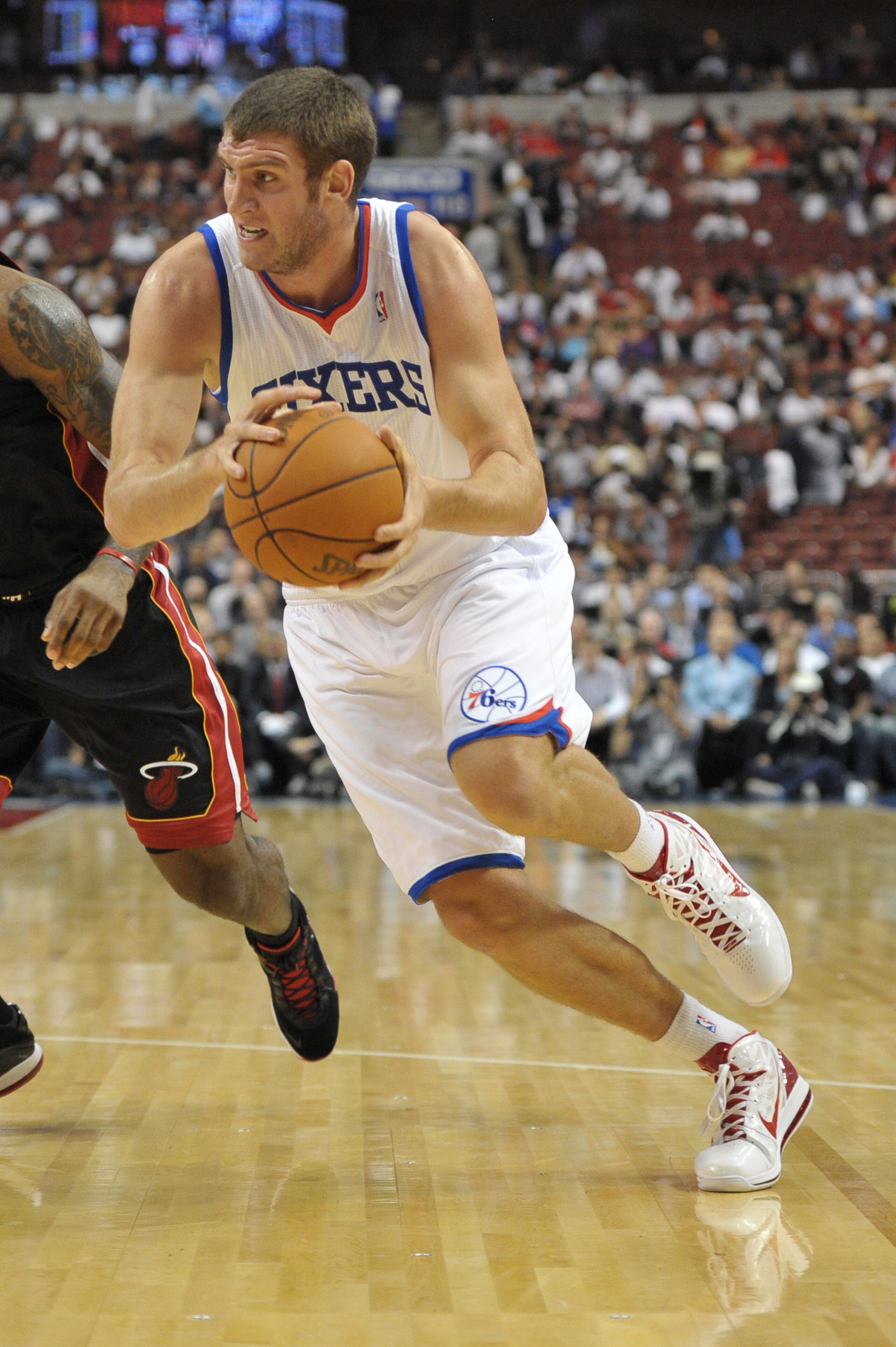 PHILADELPHIA - OCTOBER 27:  Spencer Hawes #00 of the Philadelphia 76ers in action during the game against the Miami Heat at the Wells Fargo Center on October 27, 2010 in Philadelphia, Pennsylvania. NOTE TO USER: User expressly acknowledges and agrees that