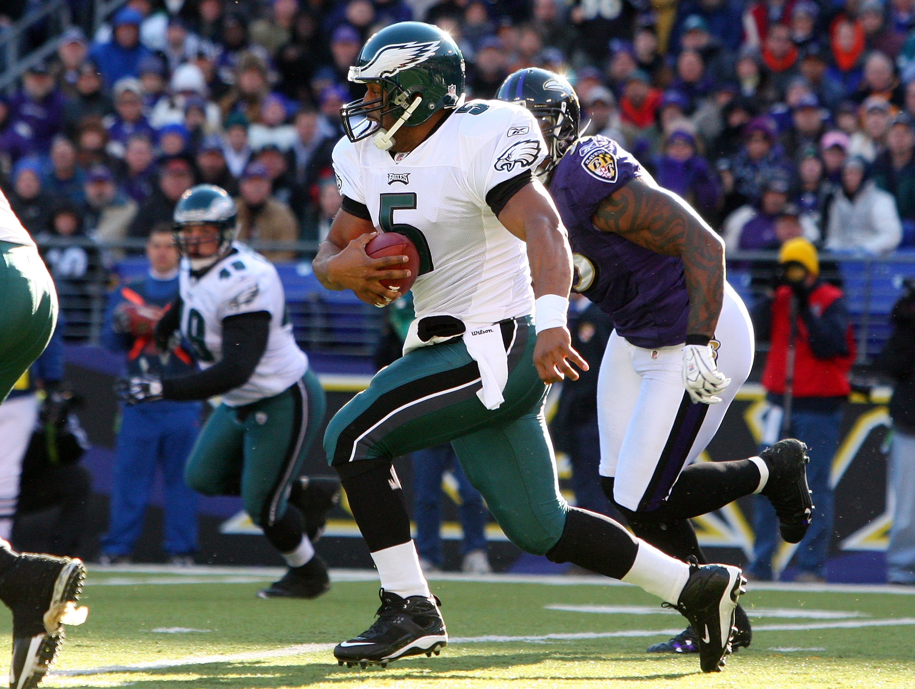 BALTIMORE - NOVEMBER 23:  Donovan McNabb #5 of the Philadelphia Eagles runs the ball against the Baltimore Ravens on November 23, 2008 at M&T Bank Stadium in Baltimore, Maryland.  (Photo by Jim McIsaac/Getty Images)