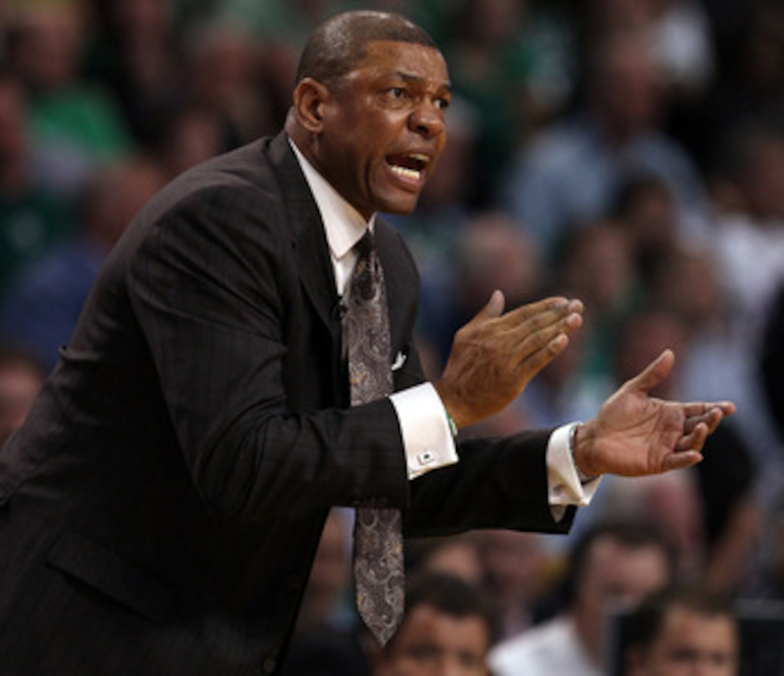 BOSTON, MA - MAY 09:  Head coach Doc Rivers of the Boston Celtics encourages his players in overtime against the Miami Heat in Game Four of the Eastern Conference Semifinals in the 2011 NBA Playoffs on May 9, 2011 at the TD Garden in Boston, Massachusetts