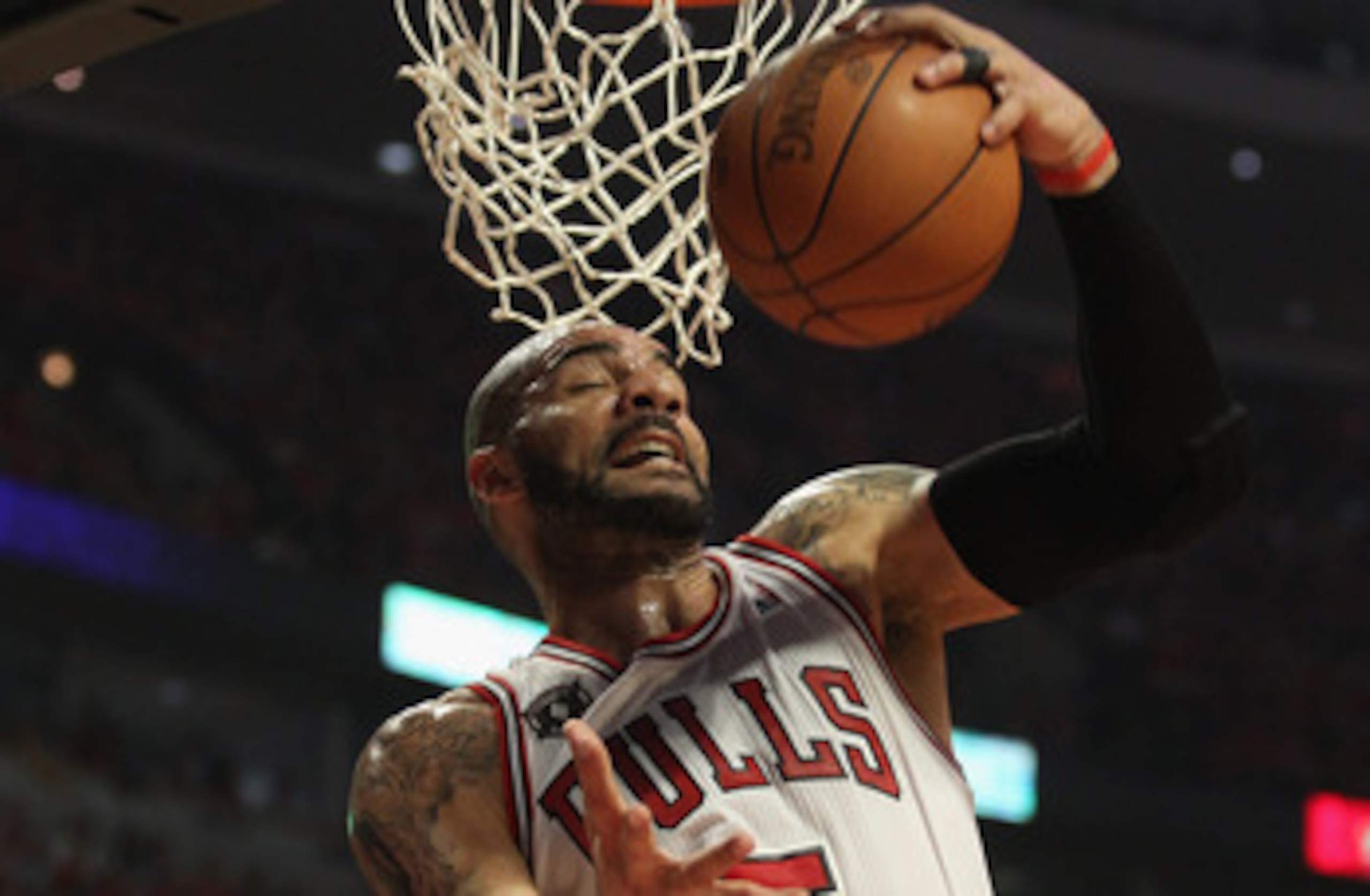 CHICAGO, IL - MAY 10: Carlos Boozer #5 of the Chicago Bulls grabs a rebound against the Atlanta Hawks in Game Five of the Eastern Conference Semifinals in the 2011 NBA Playoffs at the United Center on May 10, 2011 in Chicago, Illinois. NOTE TO USER: User