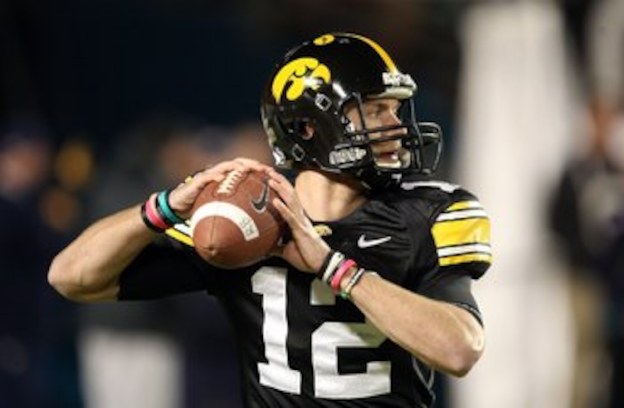 MIAMI GARDENS, FL - JANUARY 05:  Ricky Stanzi #12 of the Iowa Hawkeyes warms up against the Georgia Tech Yellow Jackets during the FedEx Orange Bowl at Land Shark Stadium on January 5, 2010 in Miami Gardens, Florida. Iowa won 24-14. (Photo by Streeter Lec
