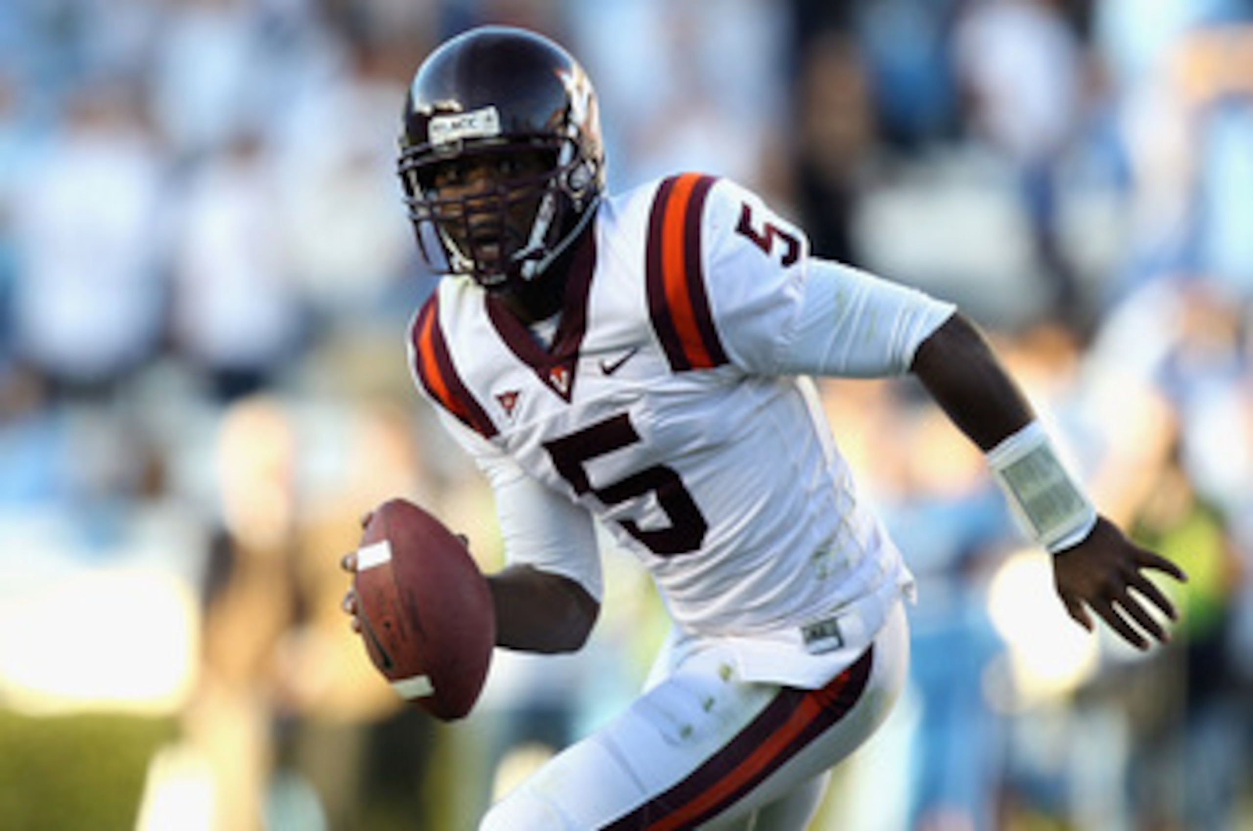 CHAPEL HILL, NC - NOVEMBER 13:  Tyrod Taylor #5 of the Virginia Tech Hokies scrambles with the ball against the North Carolina Tar Heels during their game at Kenan Stadium on November 13, 2010 in Chapel Hill, North Carolina.  (Photo by Streeter Lecka/Gett