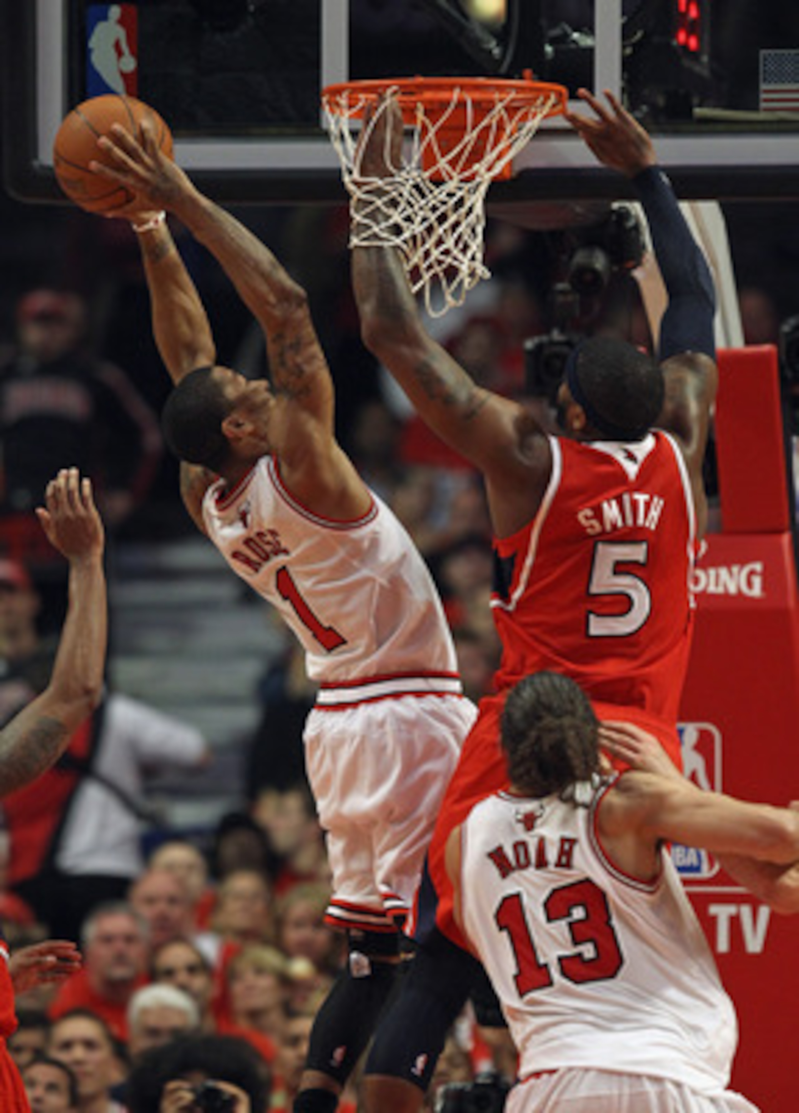 CHICAGO, IL - MAY 10: Derrick Rose #1 of the Chicago Bulls puts up a shot against Josh Smith #5 of the Atlanta Hawks in Game Five of the Eastern Conference Semifinals in the 2011 NBA Playoffs at the United Center on May 10, 2011 in Chicago, Illinois. NOTE
