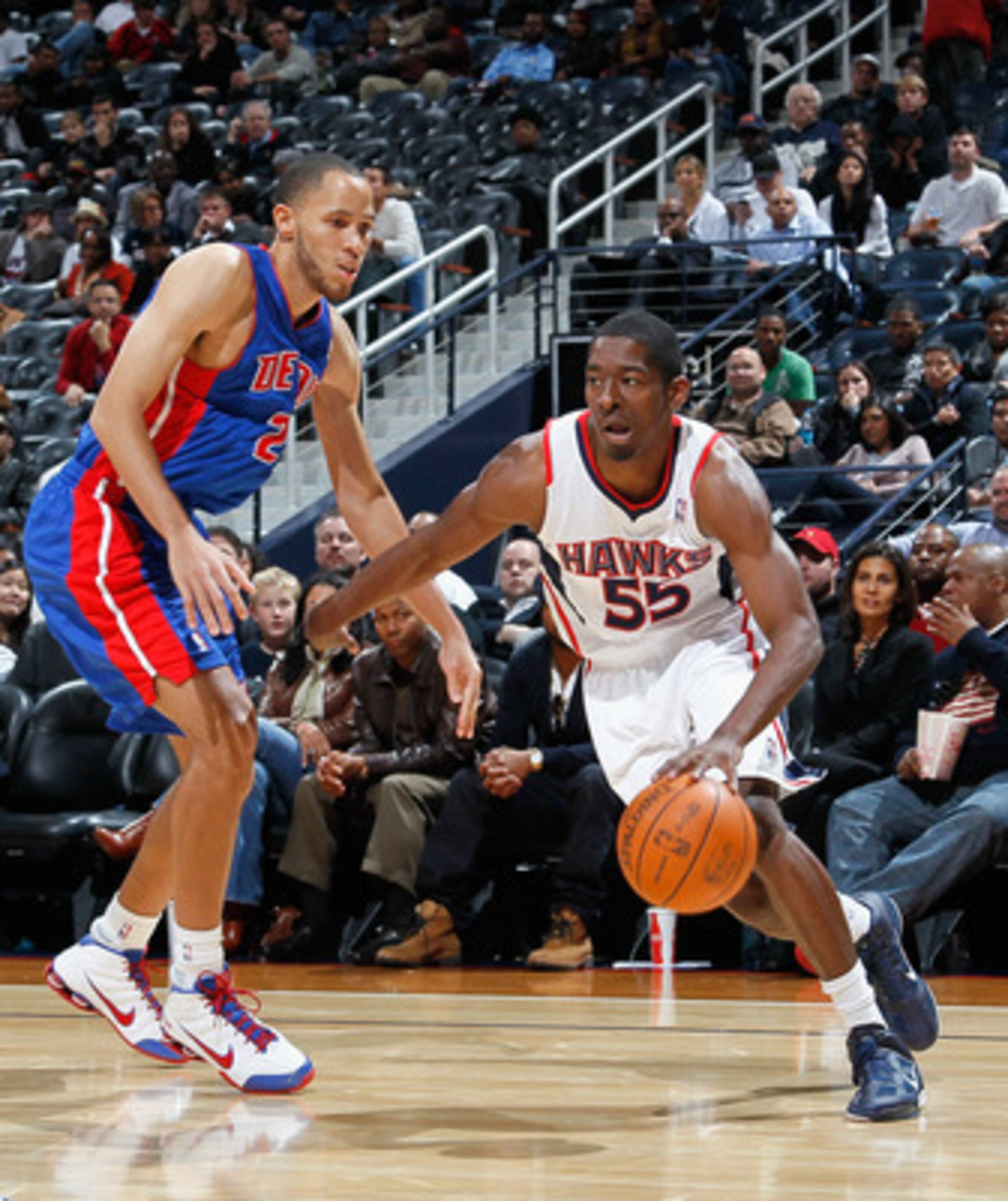 ATLANTA - NOVEMBER 03:  Jordan Crawford #55 of the Atlanta Hawks against Tayshaun Prince #22 of the Detroit Pistons at Philips Arena on November 3, 2010 in Atlanta, Georgia.  NOTE TO USER: User expressly acknowledges and agrees that, by downloading and/or
