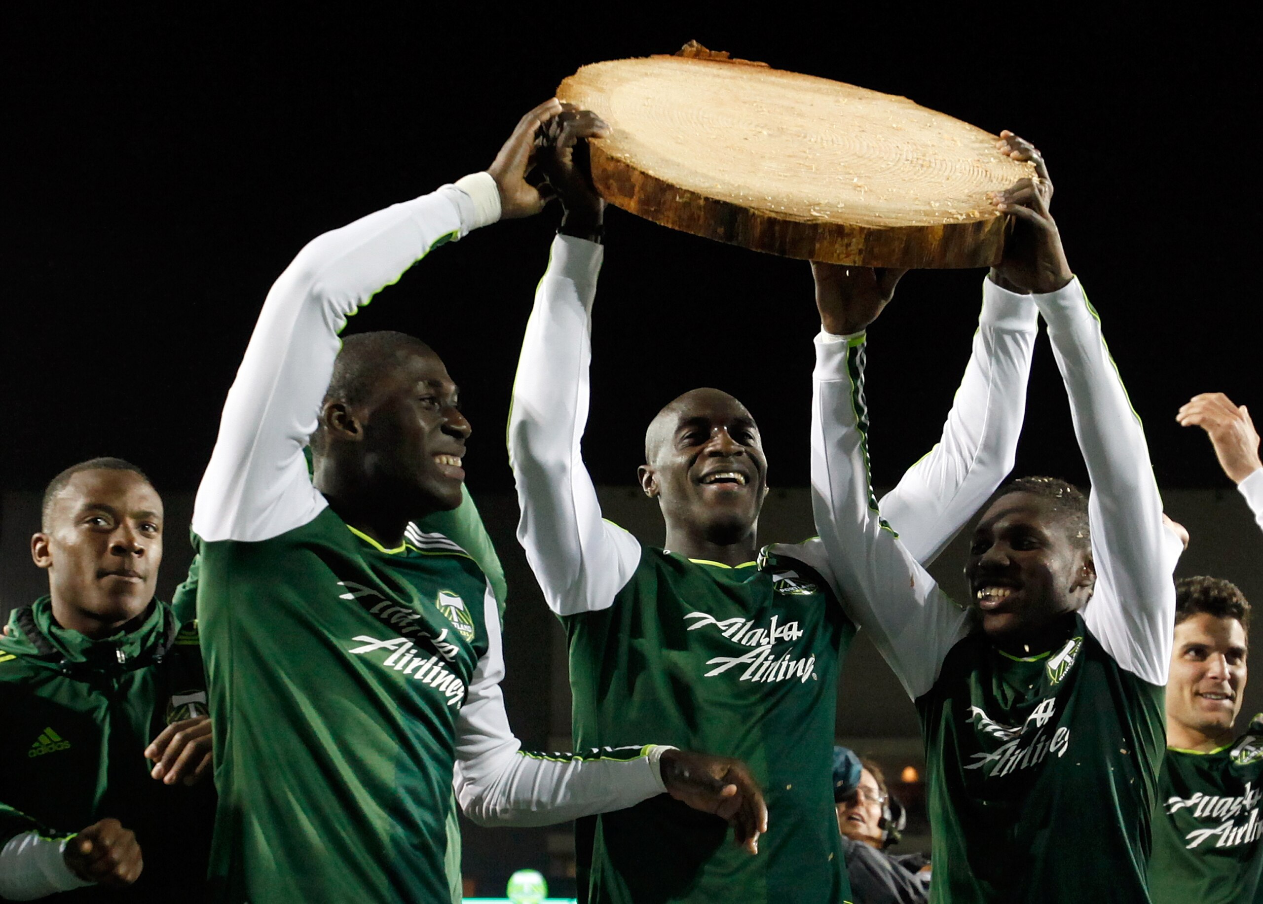 PORTLAND, OR - MAY 06:  Mamadou Danso (C) #98 of the Portland Timbers celebrates his second-half goal against the Philadelphia Union  on May 6, 2011 at Jeld-Wen Field in Portland, Oregon.  (Photo by Jonathan Ferrey/Getty Images)