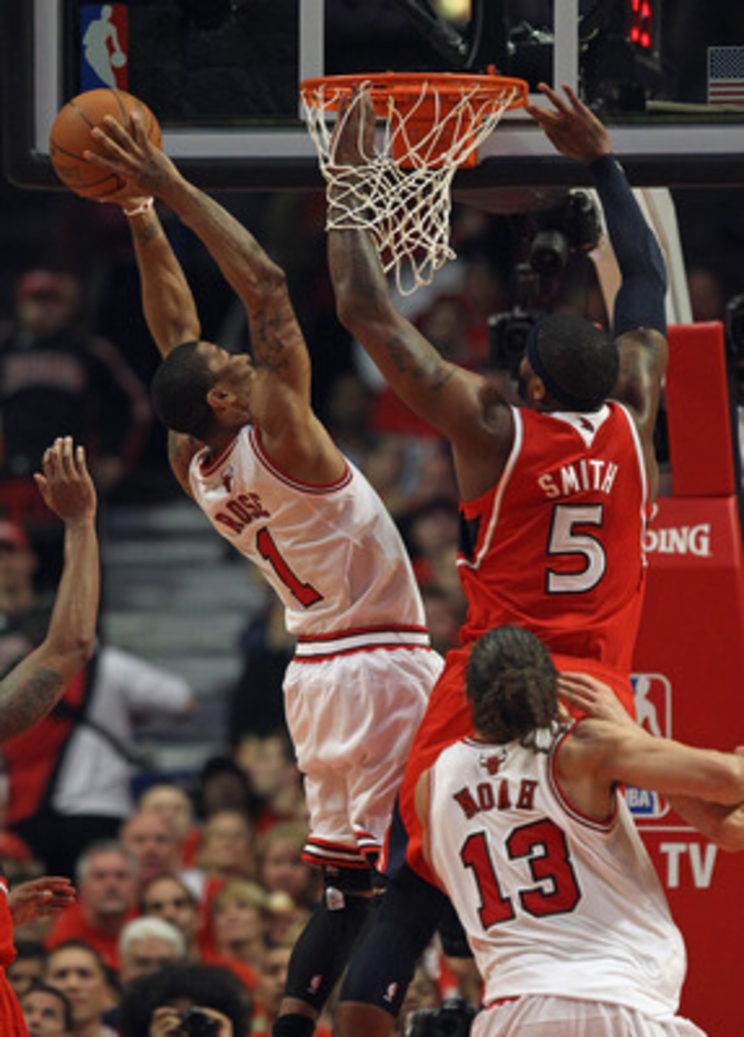 CHICAGO, IL - MAY 10: Derrick Rose #1 of the Chicago Bulls puts up a shot against Josh Smith #5 of the Atlanta Hawks in Game Five of the Eastern Conference Semifinals in the 2011 NBA Playoffs at the United Center on May 10, 2011 in Chicago, Illinois. NOTE