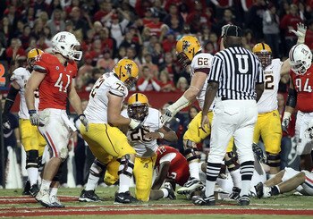 TUCSON, AZ - DECEMBER 02:  Runningback Cameron Marshall #26 of the Arizona State Sun Devils scores a rushing touchdown during the college football game at Arizona Stadium on December 2, 2010 in Tucson, Arizona. The Sun Devils defeated the Wildcats 30-29 i