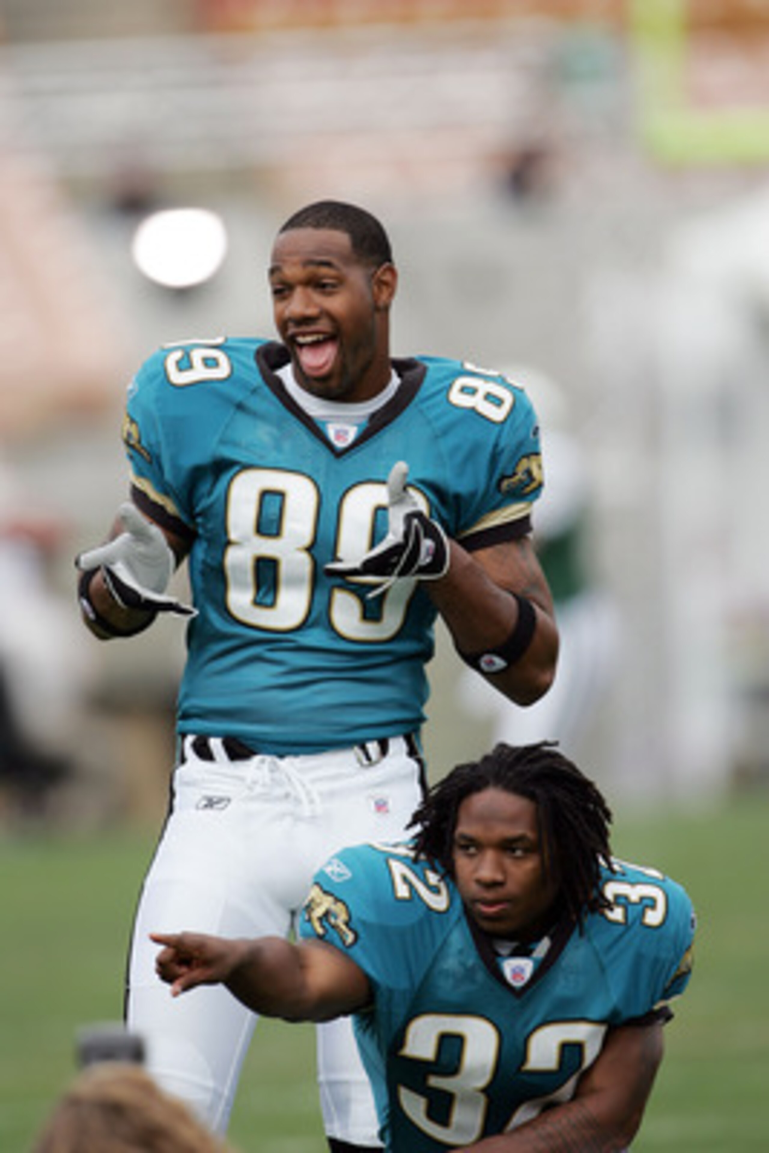 LOS ANGELES - MAY 20:  Running back Maurice Drew (bottom) #32, the Jacksonville Jaguars second round NFL draft pick, hams it up for trading card photos with wide receiver Marcedes Lewis #89, the Jaguars first round NFL draft pick, during the NFL Players R
