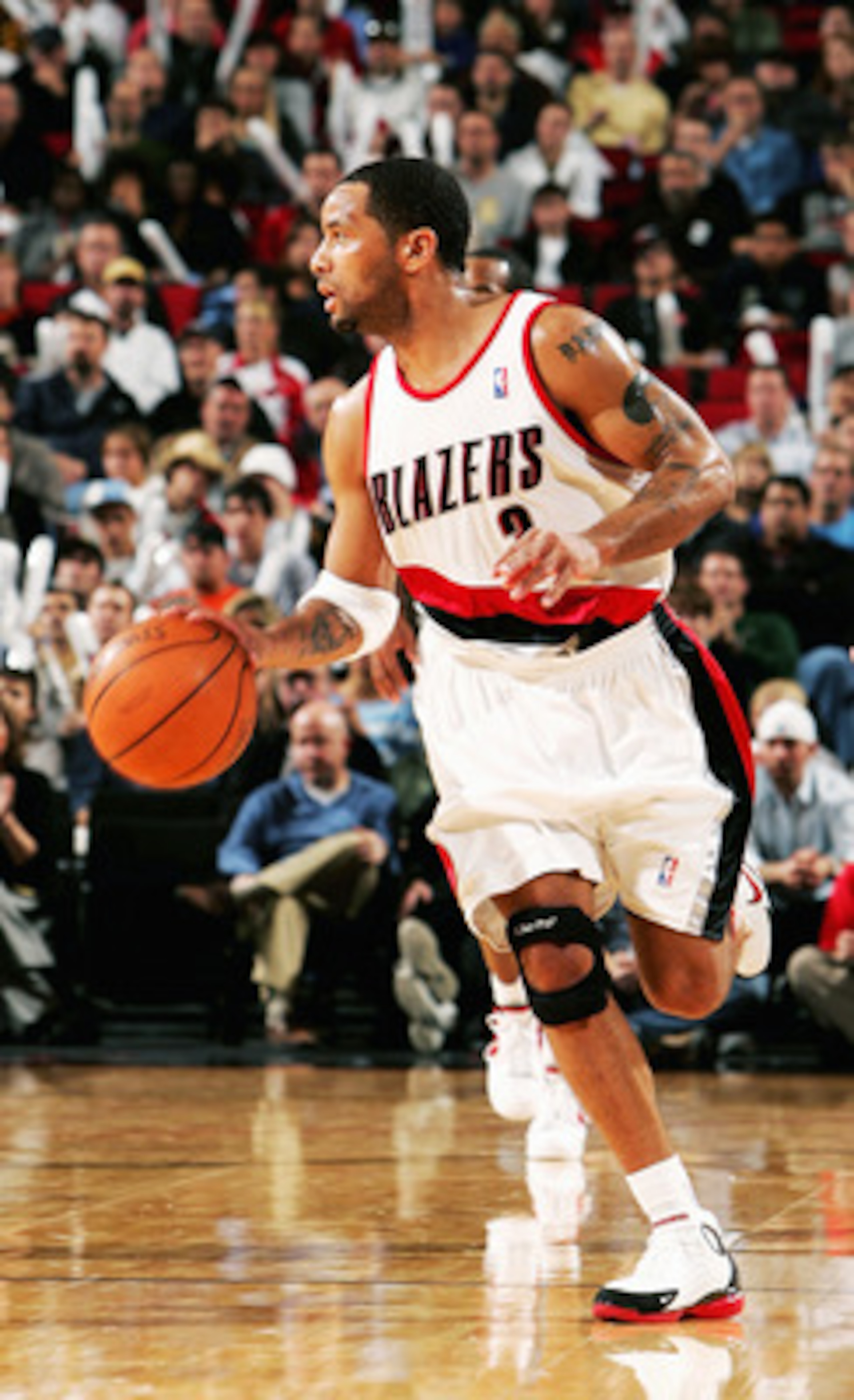 PORTLAND, OR - NOVEMBER 19: Damon Stoudamire #3 dribbles the ball of the Portland Trail Blazers during the Milwaukee Bucks versus Portland Trail Blazers game on November 19, 2004 at the Rose Garden in Portland, Oregon. NOTE TO USER: User expressly acknowl