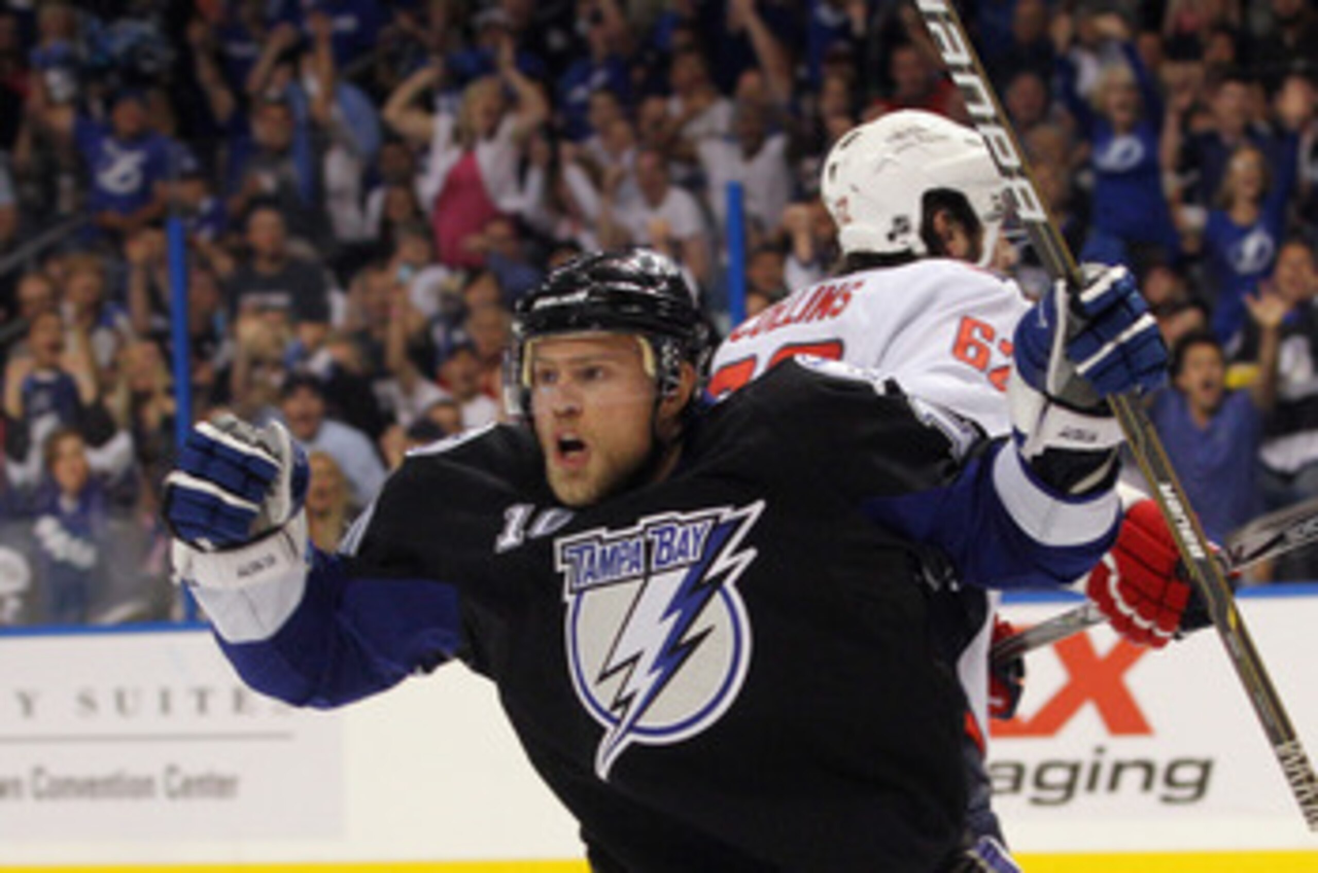 TAMPA, FL - MAY 04:  Sean Bergenheim #10 of the Tampa Bay Lightning scores at 4:41 of the second period against the Washington Capitals in Game Four of the Eastern Conference Semifinals during the 2011 NHL Stanley Cup Playoffs at the St Pete Times Forum o