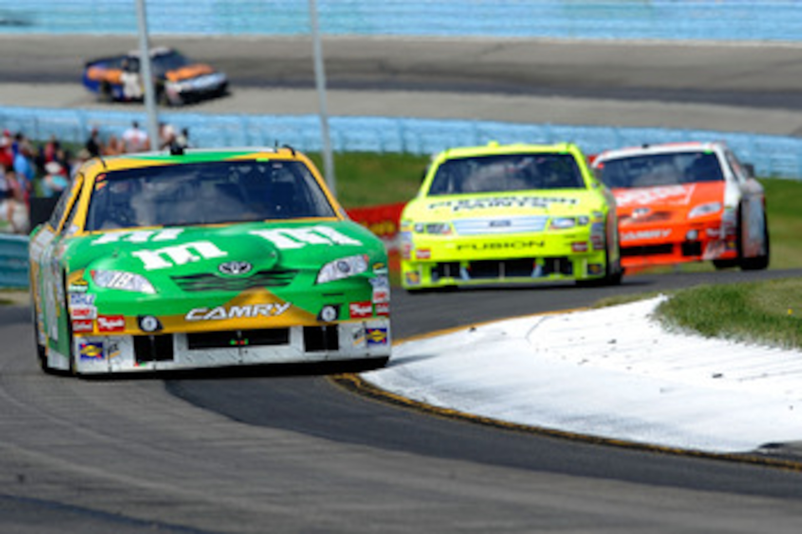 WATKINS GLEN, NY - AUGUST 08:  Kyle Busch, drives the #18 M&M's Toyota, during the NASCAR Sprint Cup Series Heluva Good! Sour Cream Dips at Watkins Glen International on August 8, 2010 in Watkins Glen, New York.  (Photo by Jeff Zelevansky/Getty Images for
