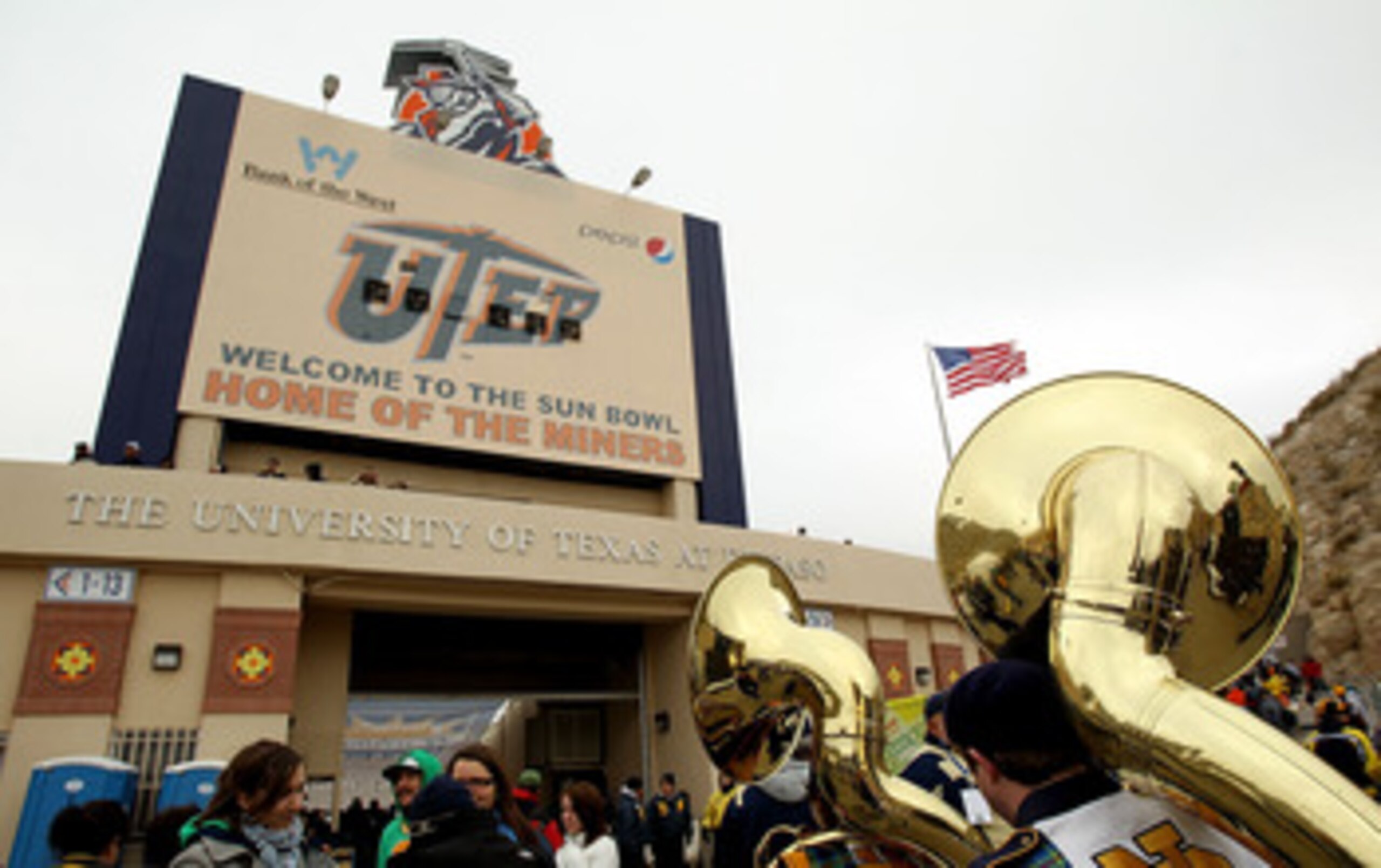 EL PASO, TX - DECEMBER 31:  Fans walk to the Sun Bowl before the Hyundai Sun Bowl game between the Notre Dame Fighting Irish and Miami Hurricanes on December 31, 2010 in El Paso, Texas.  (Photo by Ronald Martinez/Getty Images)
