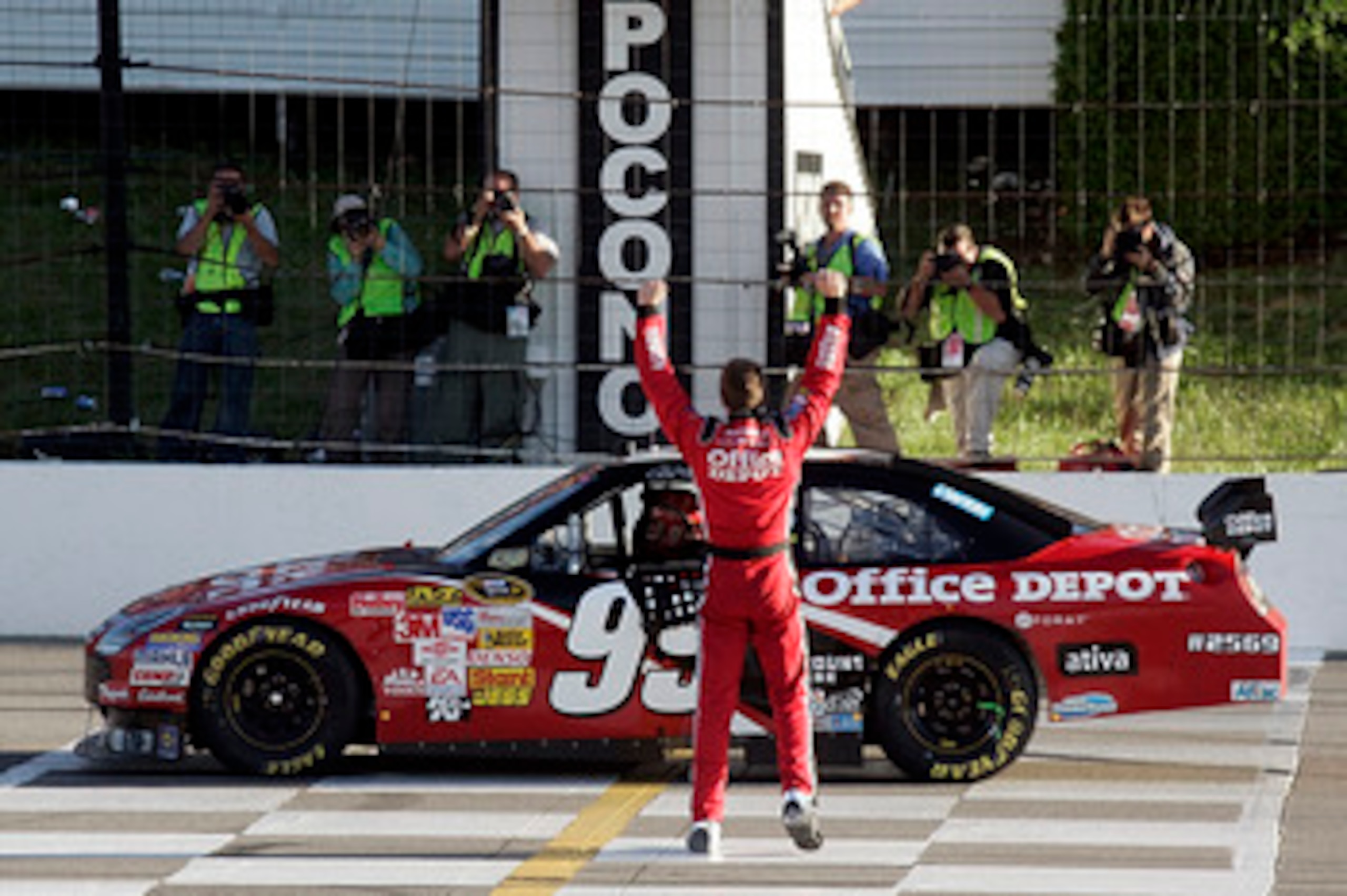 LONG POND, PA - AUGUST 03:  Carl Edwards, driver of the #99 Office Depot celebrates winning the NASCAR Sprint Cup Series Pennsylvania 500 at the Pocono Raceway on August 3, 2008 in Long Pond, Pennsylvania.  (Photo by Jason Smith/Getty Images for NASCAR)