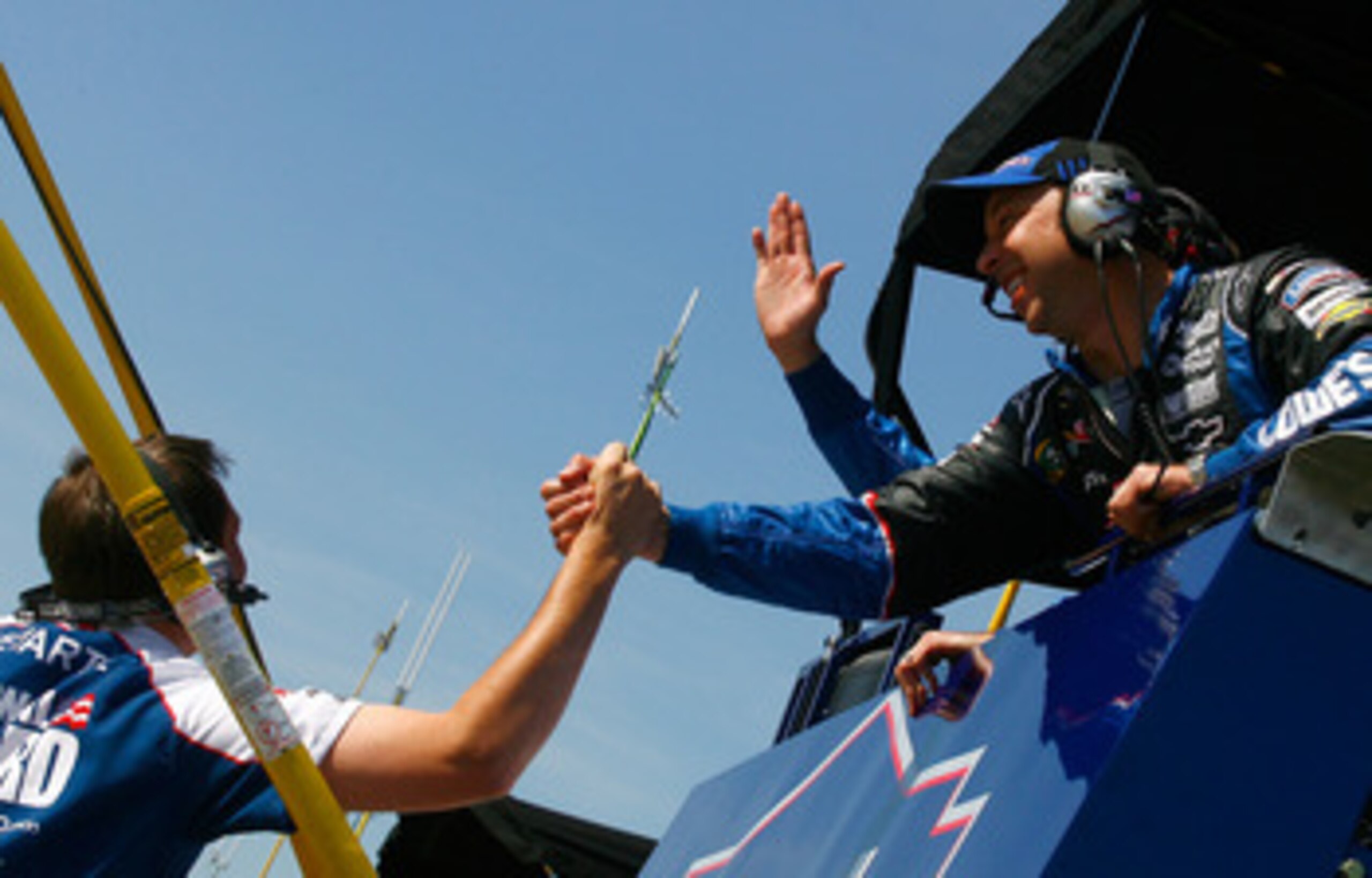 TALLADEGA, AL - APRIL 17:  Steve Letarte (L), crew chief of the #88 National Guard/Amp Energy Chevrolet, shakes hands with Chad Knaus (R), crew chief of the #48 Lowe's Chevrolet, after Jimmie Johnson won the NASCAR Sprint Cup Series Aaron's 499 at Tallade