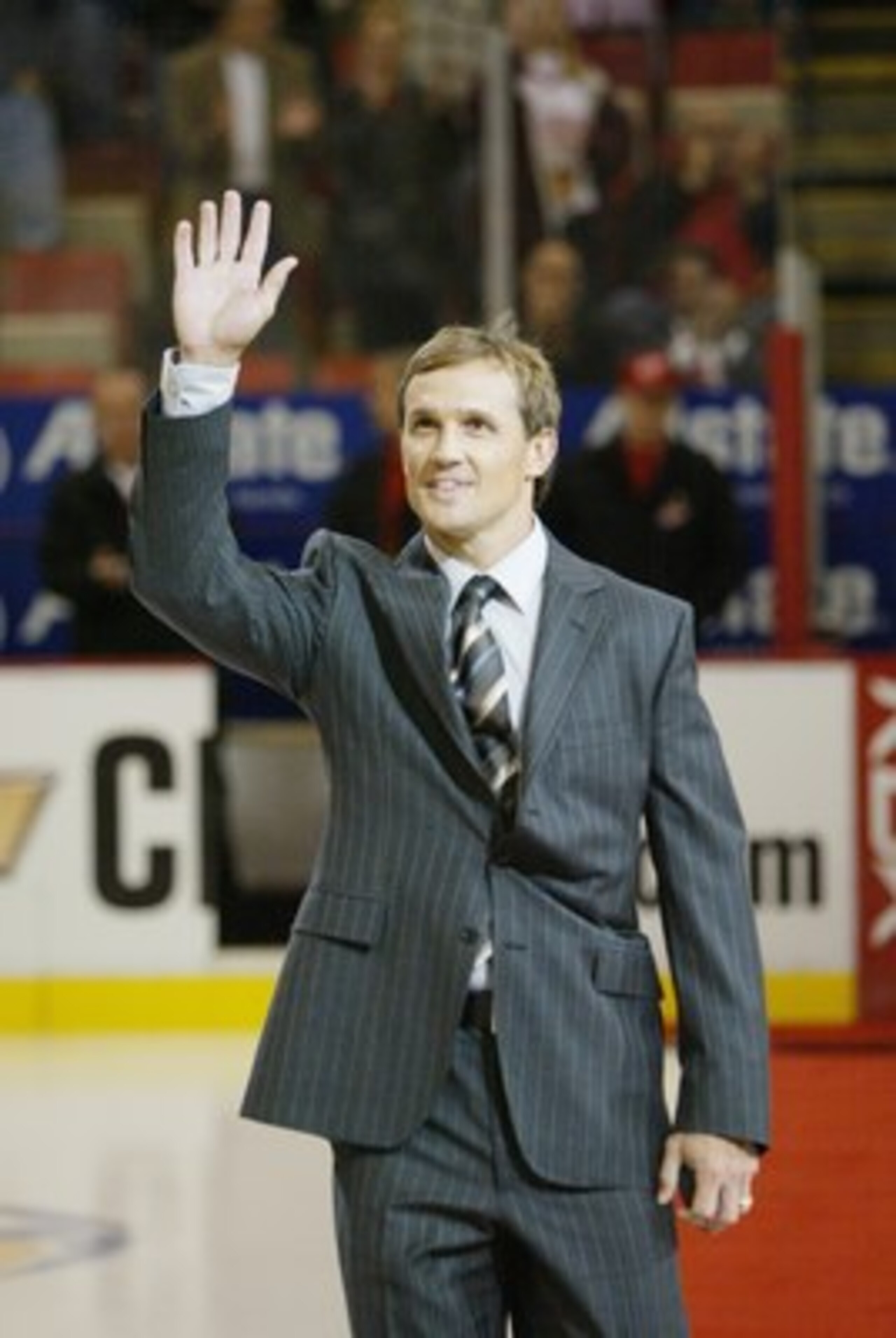 DETROIT - OCTOBER 5:  Former Detroit Red Wings captain Steve Yzerman is introduced before the game against the Vancouver Canucks at Joe Louis Arena on October 5, 2006 in Detroit, Michigan.The Canucks won 3-1. (Photo by Dave Sandford/Getty Images)