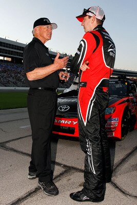 FORT WORTH, TX - APRIL 08:  Kyle Busch, driver of the #18 Z-Line Designs Toyota, talks to team owner Joe Gibbs on the grid prior to the NASCAR Nationwide Series O'Reilly Auto Parts 300 at Texas Motor Speedway on April 8, 2011 in Fort Worth, Texas.  (Photo