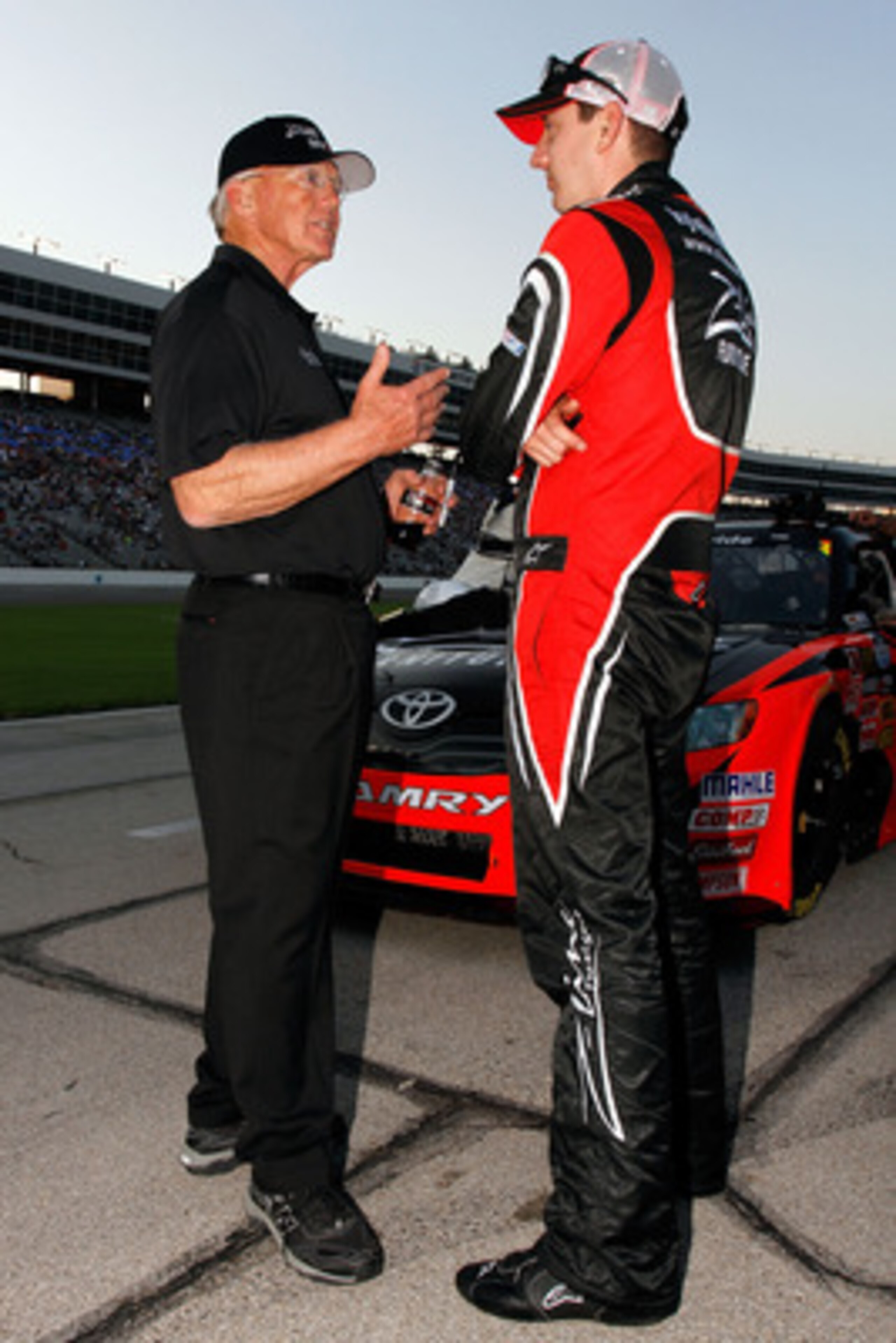 FORT WORTH, TX - APRIL 08:  Kyle Busch, driver of the #18 Z-Line Designs Toyota, talks to team owner Joe Gibbs on the grid prior to the NASCAR Nationwide Series O'Reilly Auto Parts 300 at Texas Motor Speedway on April 8, 2011 in Fort Worth, Texas.  (Photo