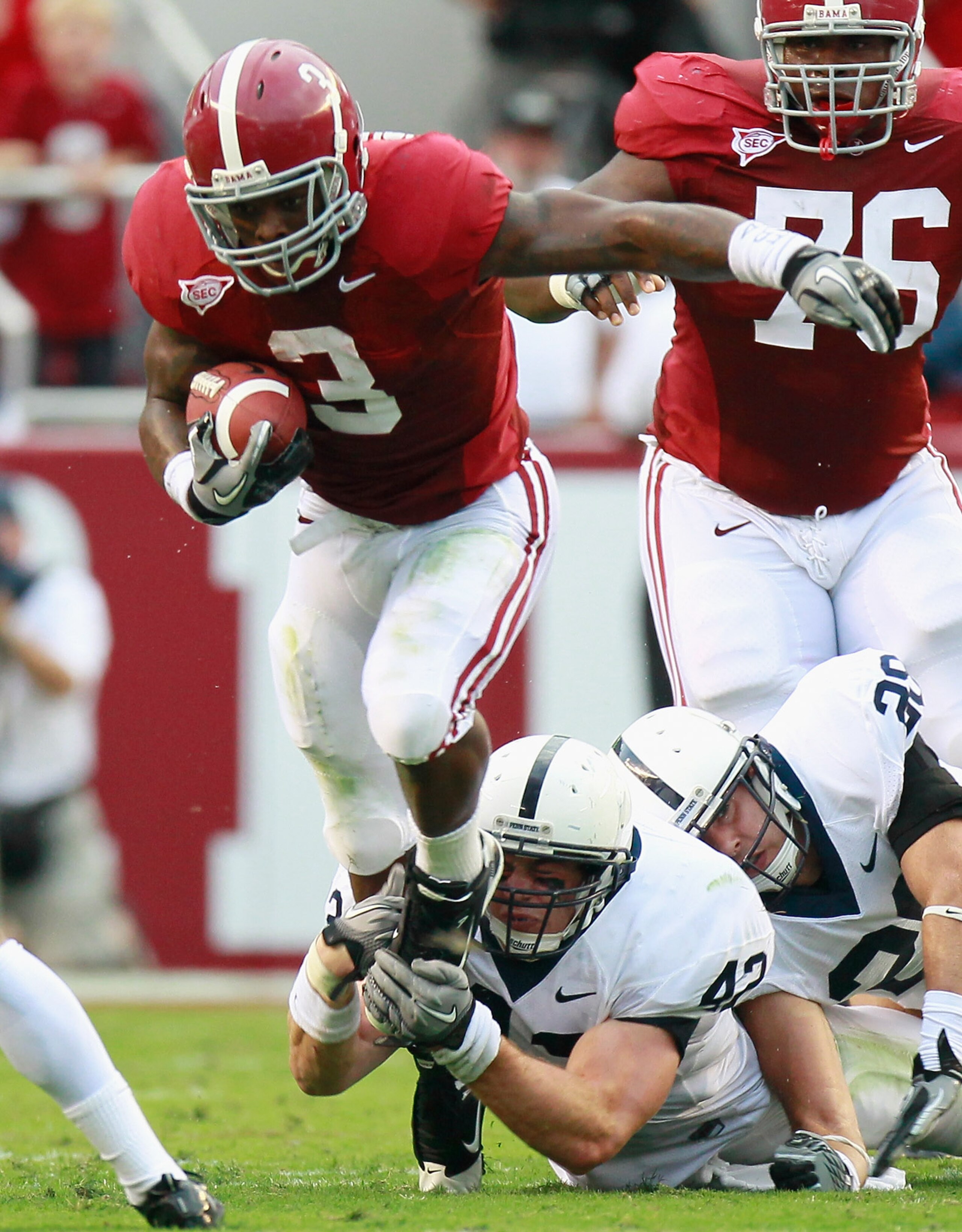 TUSCALOOSA, AL - SEPTEMBER 11:  Trent Richardson #3 of the Alabama Crimson Tide is tackled by Michael Mauti #42 of the Penn State Nittany Lions at Bryant-Denny Stadium on September 11, 2010 in Tuscaloosa, Alabama.  (Photo by Kevin C. Cox/Getty Images)
