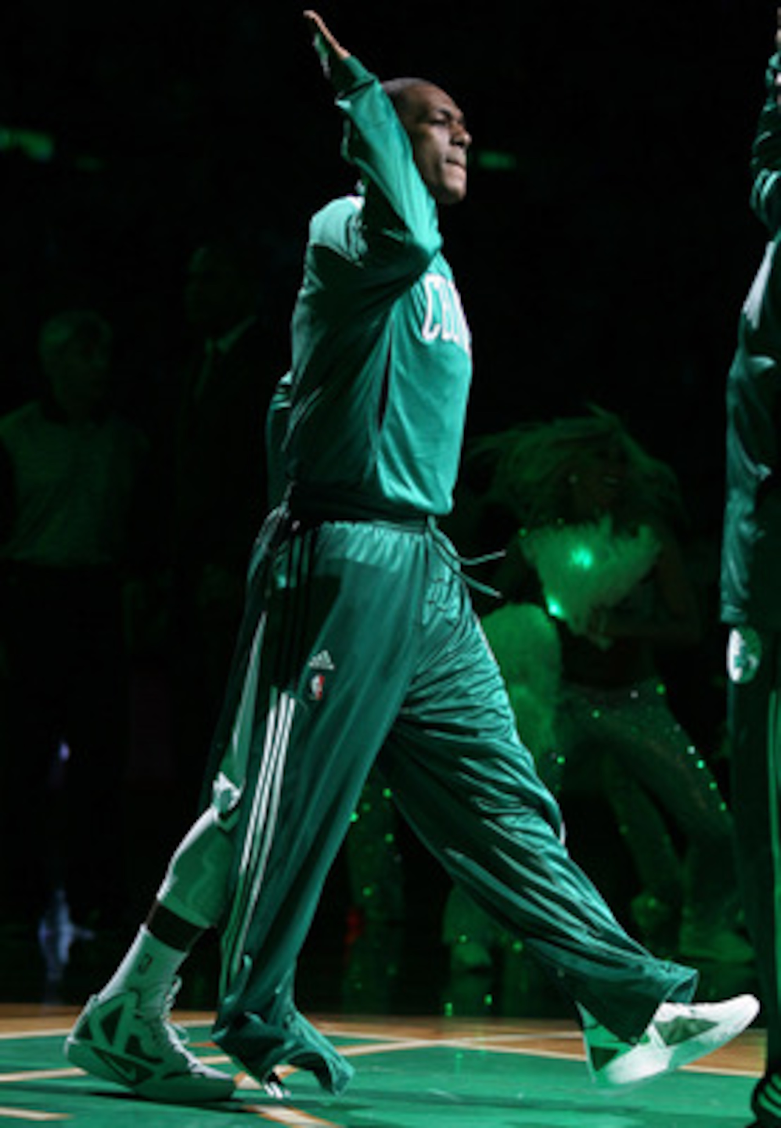BOSTON, MA - MAY 09: Rajon Rondo #9 of the Boston Celtics walks out as he is annouced in the starting line up before Game Four of the Eastern Conference Semifinals in the 2011 NBA Playoffs on May 9, 2011 at the TD Garden in Boston, Massachusetts.  NOTE TO