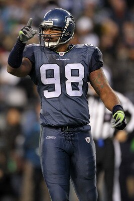 SEATTLE, WA - JANUARY 08:  Raheem Brock #98 of the Seattle Seahawks reacts to a defensice stop in the second half against the New Orleans Saints during the 2011 NFC wild-card playoff game at Qwest Field on January 8, 2011 in Seattle, Washington.  (Photo b