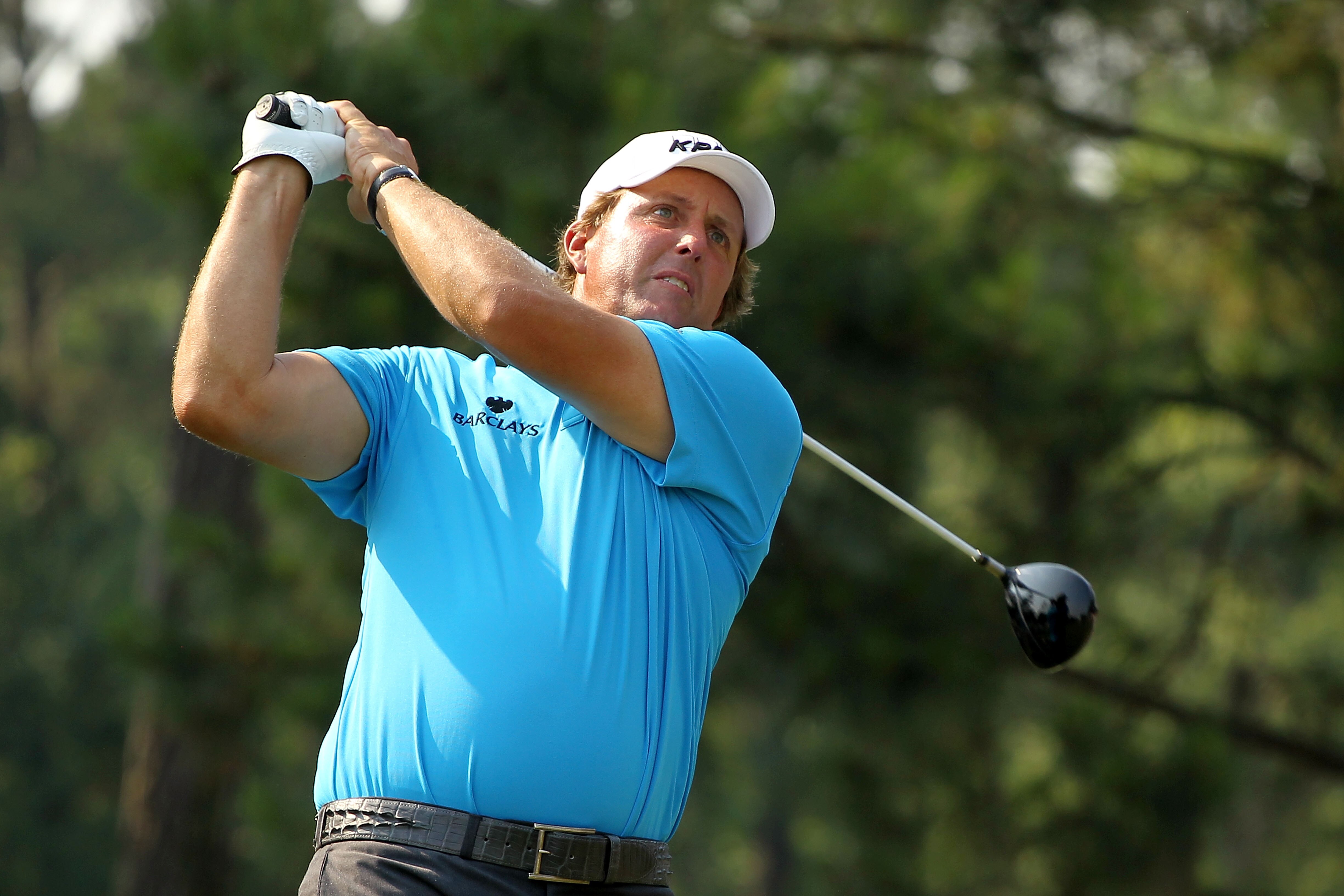 PONTE VEDRA BEACH, FL - MAY 10:  Phil Mickelson hits a shot during a practice round prior to the start of THE PLAYERS Championship held at THE PLAYERS Stadium course at TPC Sawgrass on May 10, 2011 in Ponte Vedra Beach, Florida.  (Photo by Scott Halleran/