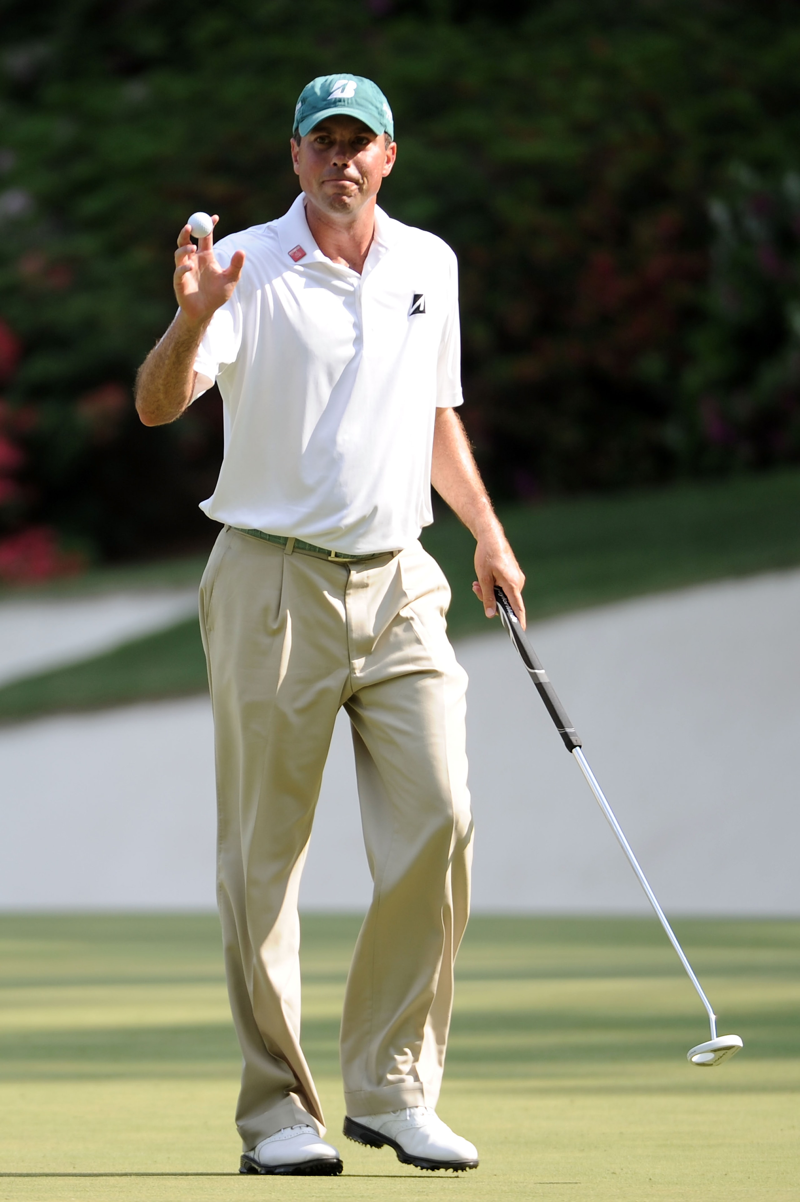 AUGUSTA, GA - APRIL 10:  Matt Kuchar waves to fans during the final round of the 2011 Masters Tournament at Augusta National Golf Club on April 10, 2011 in Augusta, Georgia.  (Photo by Harry How/Getty Images)