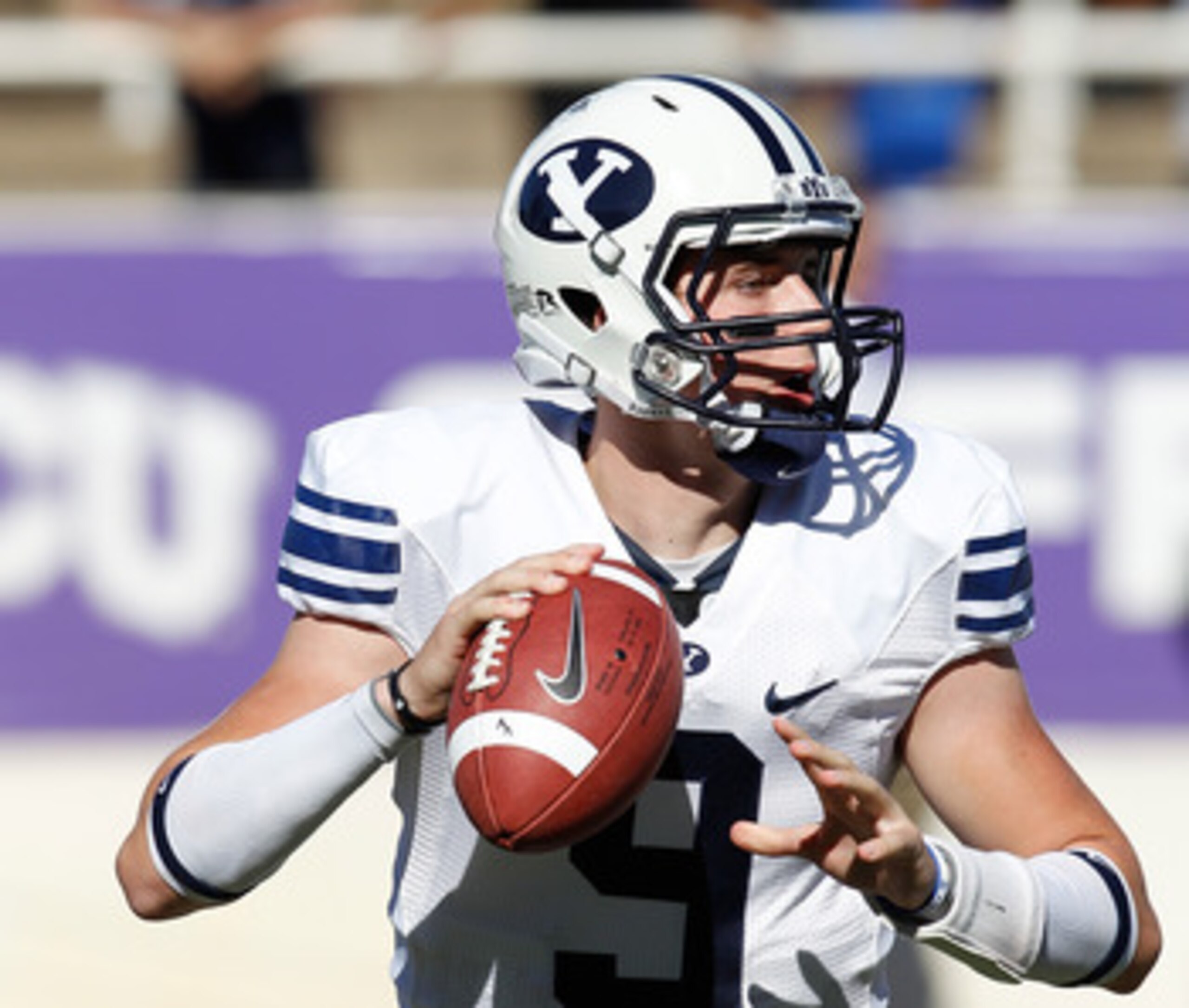 FORT WORTH, TX - OCTOBER 16:  Quarterback Jake Heaps #9 of the Brigham Young University Cougars throws a pass against the Texas Christian University Horned Frogs at Amon G. Carter Stadium on October 16, 2010 in Fort Worth, Texas.  (Photo by Tom Pennington
