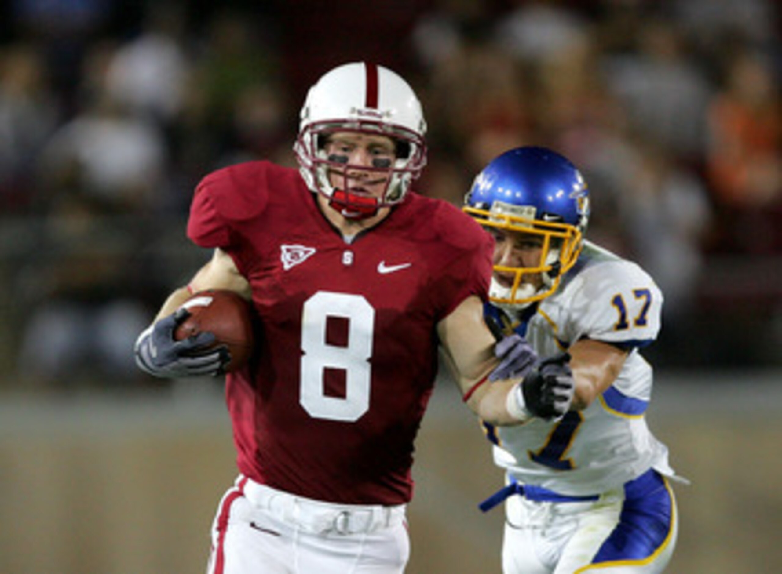 PALO ALTO, CA - SEPTEMBER 19:  Ryan Whalen #8 of the Stanford Cardinal tries to outrun Tanner Burns #17 of the San Jose State Spartans at Stanford Stadium on September 19, 2009 in Palo Alto, California.  (Photo by Ezra Shaw/Getty Images)