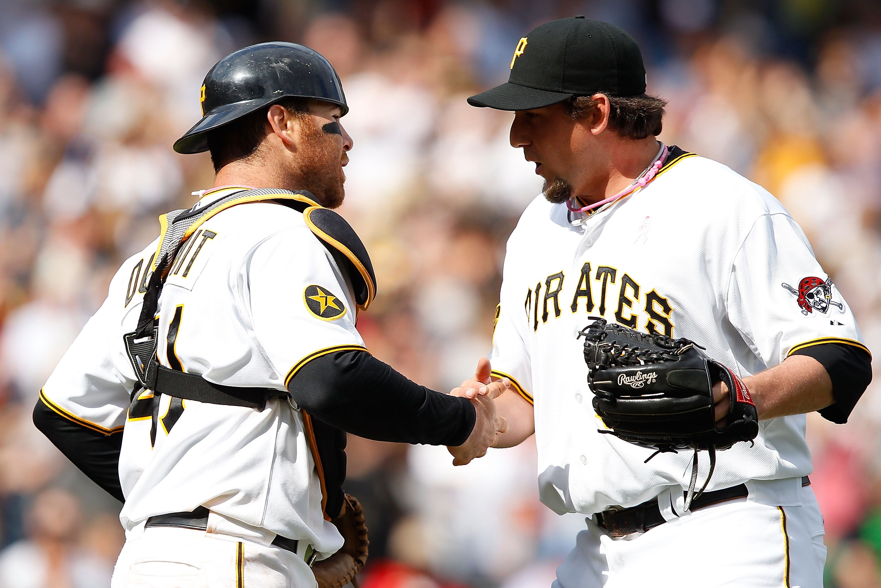 PITTSBURGH - MAY 08:  Joel Hanrahan #52 of the Pittsburgh Pirates celebrates with teammate Ryan Doumit #41 after their win against the Houston Astros during the game on May 8, 2011 at PNC Park in Pittsburgh, Pennsylvania.  (Photo by Jared Wickerham/Getty